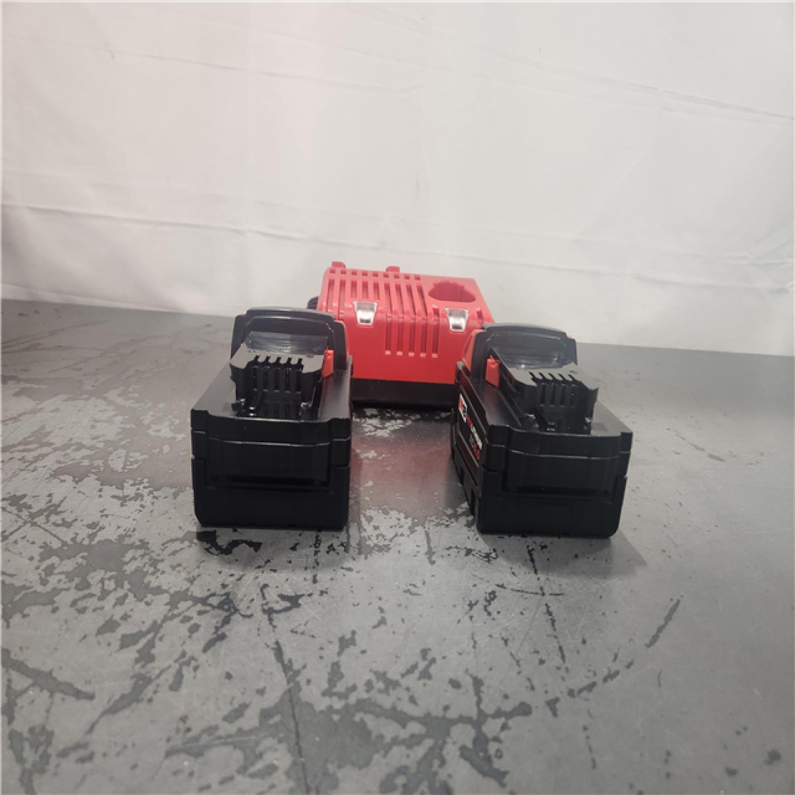 AS-IS- Milwaukee 18-Volt Lithium-Ion XC Starter Kit with Two 5.0Ah Batteries and Charger