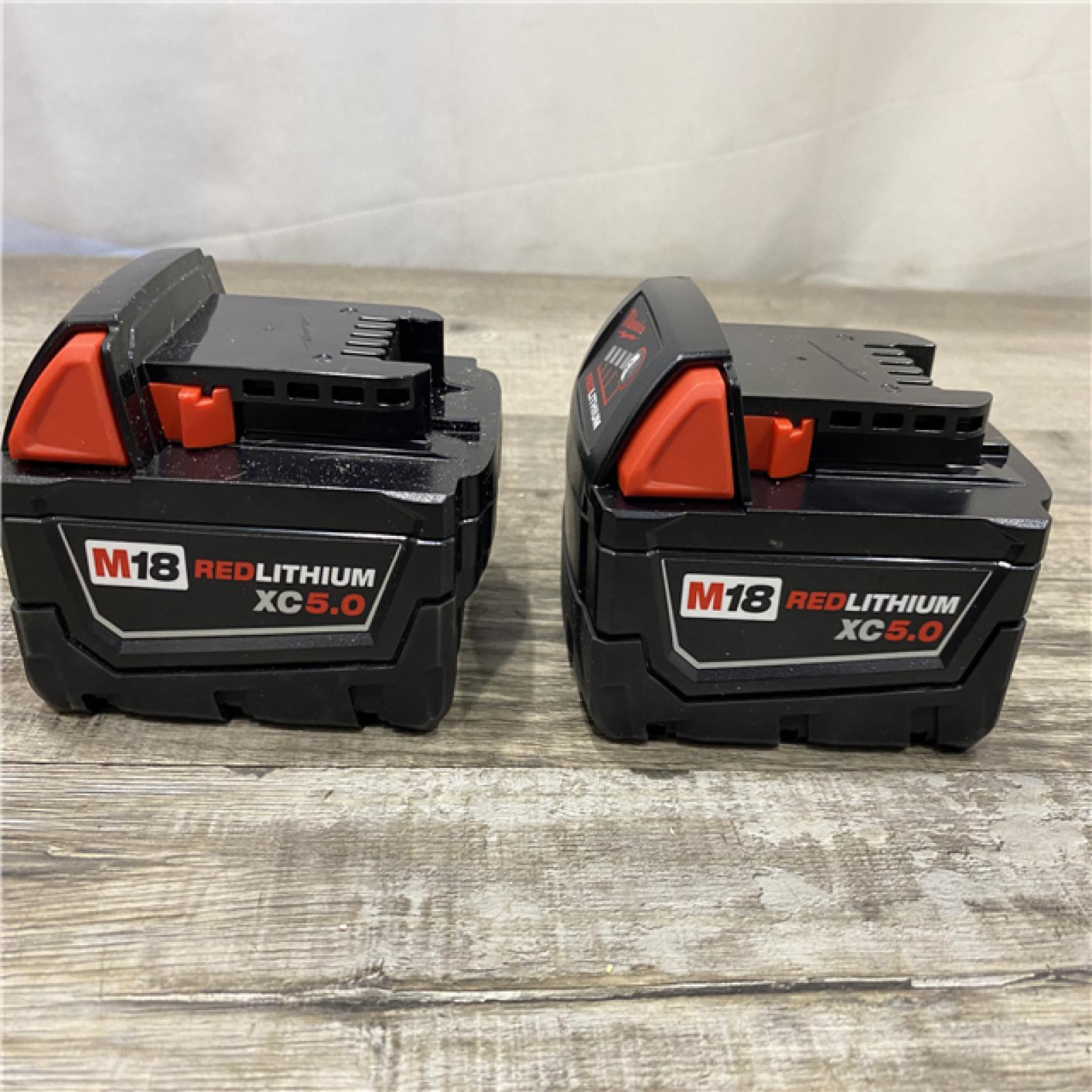 AS-IS Milwaukee FUEL 18V Lithium-Ion Brushless Cordless Hammer Drill and Impact Driver Combo Kit