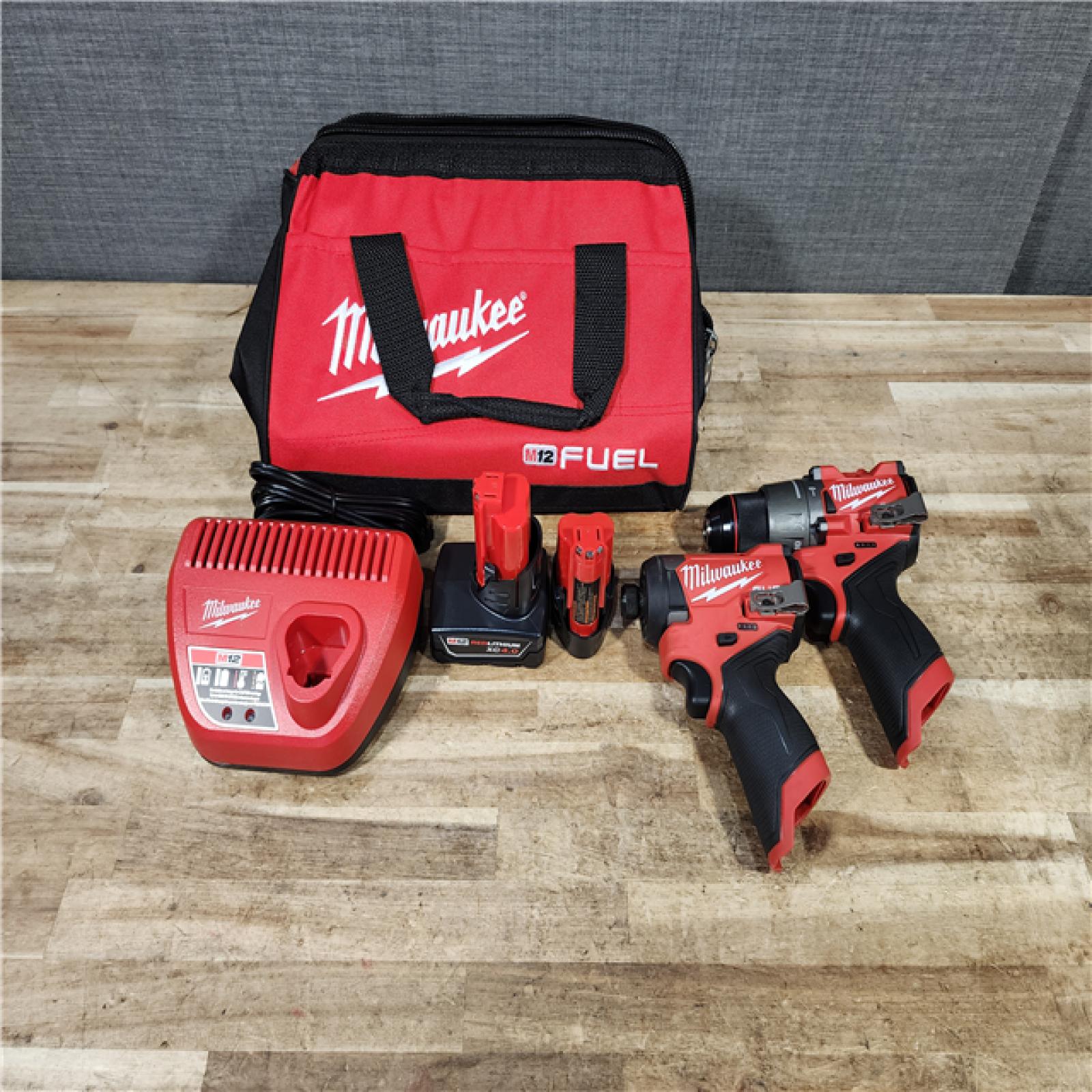 HOUSTON LOCATION - AS - IS Milwaukee FUEL 12-Volt Lithium-Ion Brushless Cordless Hammer Drill and Impact Driver Combo Kit