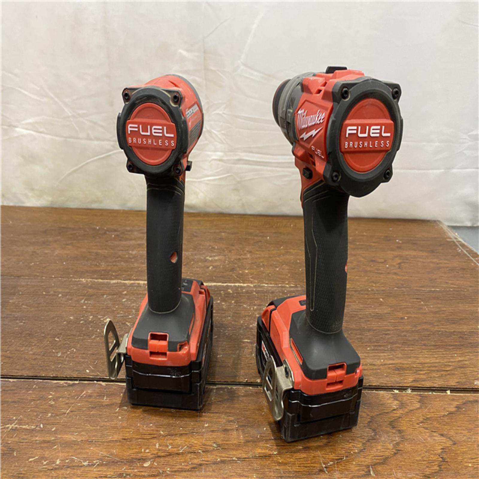 AS-IS MILWAUKEE M18 FUEL 18V Lithium-Ion Brushless Cordless Hammer Drill and Impact Driver Combo Kit (2-Tool) with 2 Batteries