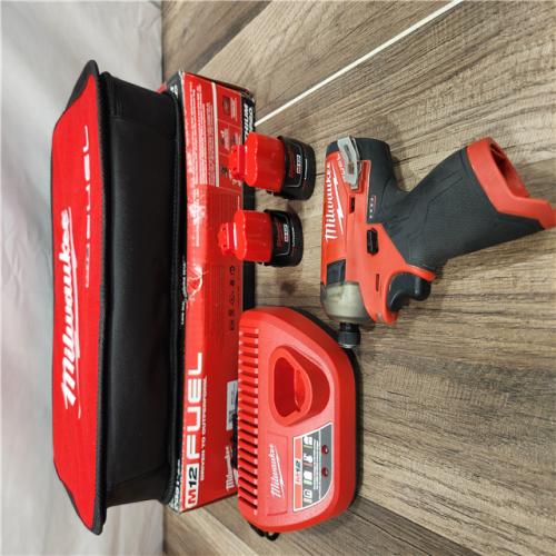 AS-IS Milwaukee M12 FUEL SURGE 12V Lithium-Ion Brushless Cordless 1/4 in. Hex Impact Driver Compact Kit W/Two 2.0Ah Batteries, Bag