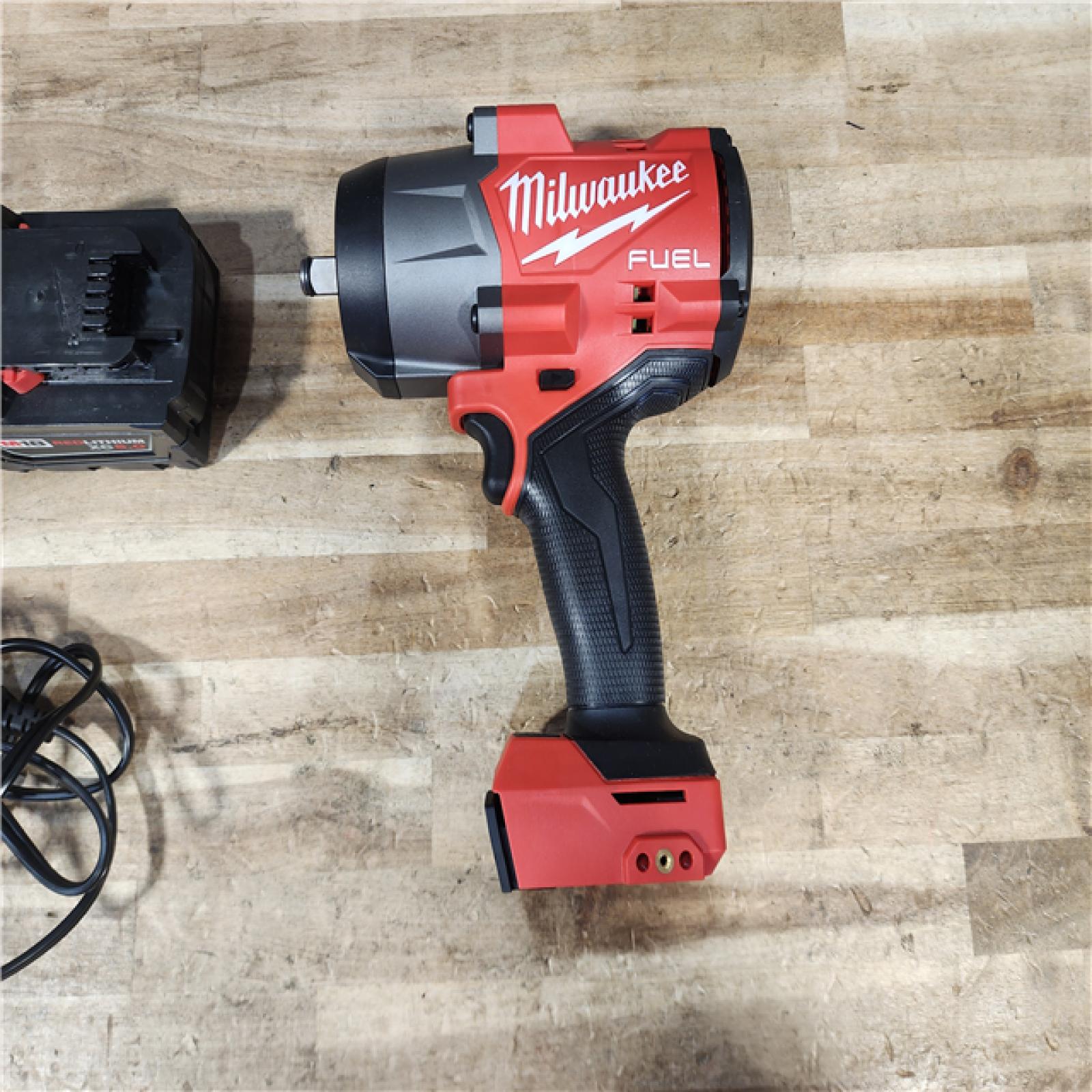 HOUSTON LOCATION - AS - IS Milwaukee FUEL 18V Lithium-Ion Brushless Cordless 1/2 in. Impact Wrench with Friction Ring W/ BATTERY & CHARGER