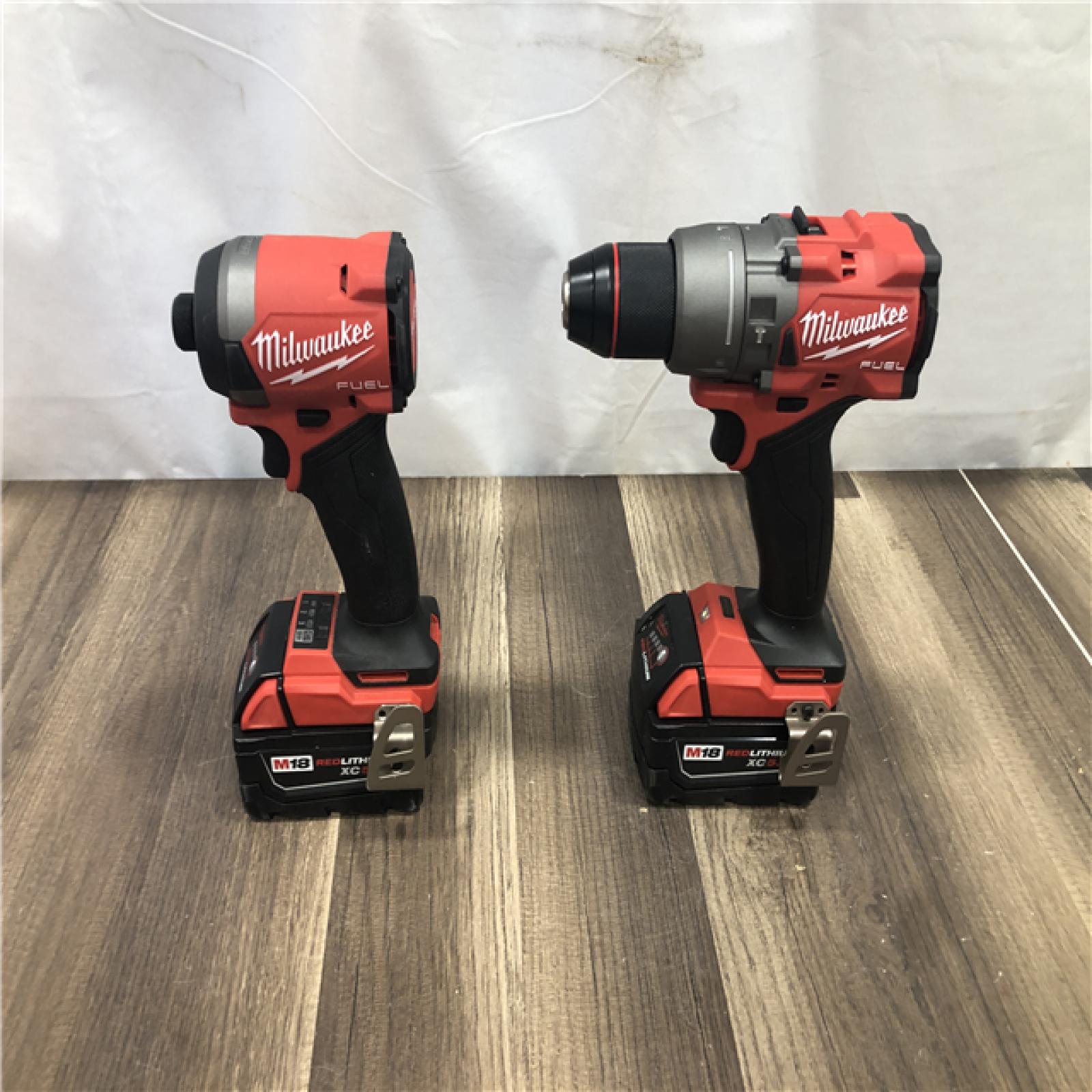 AS-IS Milwaukee  FUEL 18V Lithium-Ion Brushless Cordless Hammer Drill and Impact Driver Combo Kit