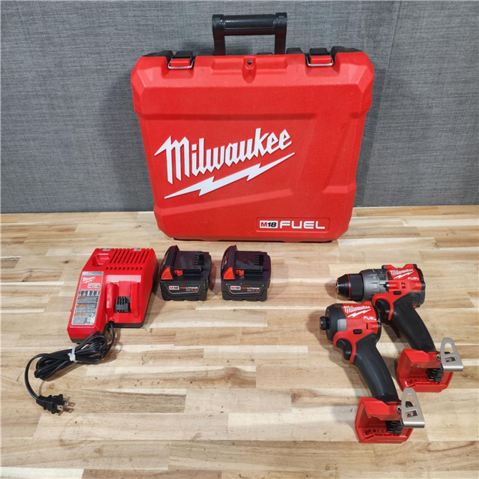 HOUSTON LOCATION - AS-IS Milwaukee  FUEL 18V Lithium-Ion Brushless Cordless Hammer Drill and Impact Driver Combo Kit