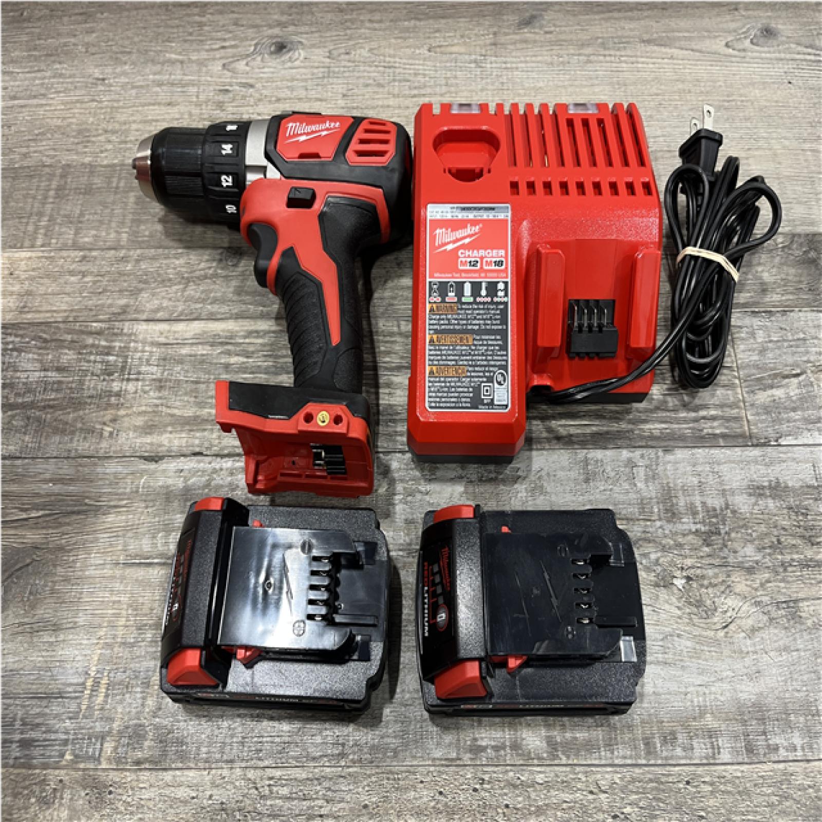 AS-IS Milwaukee 18V Lithium-Ion Cordless 1/2 in. Drill Driver Kit