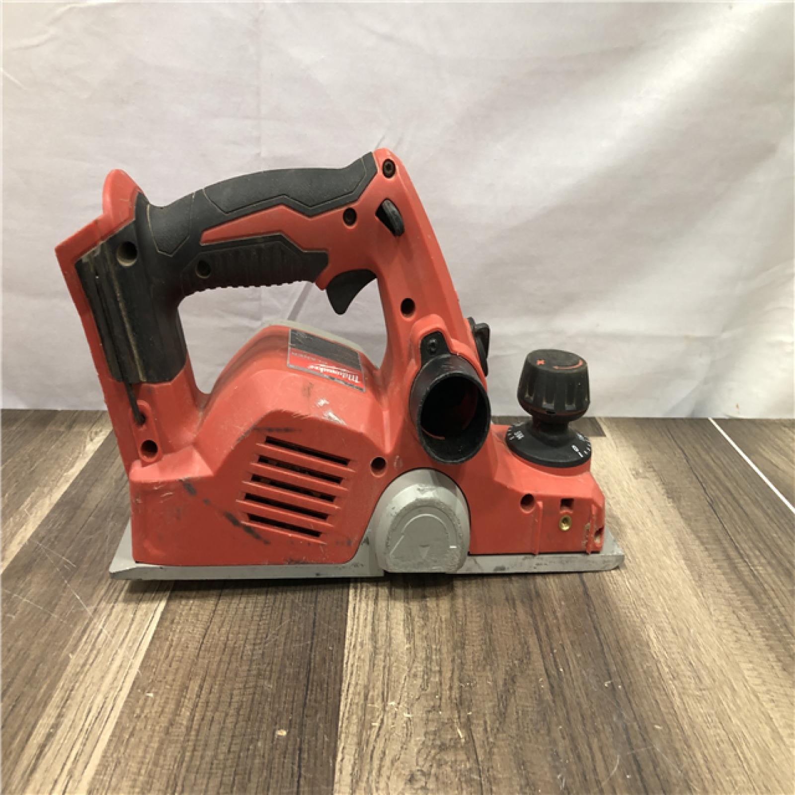 AS-IS Milwaukee M18 18V Lithium-Ion Cordless 3-1/4 in. Planer (Tool-Only)