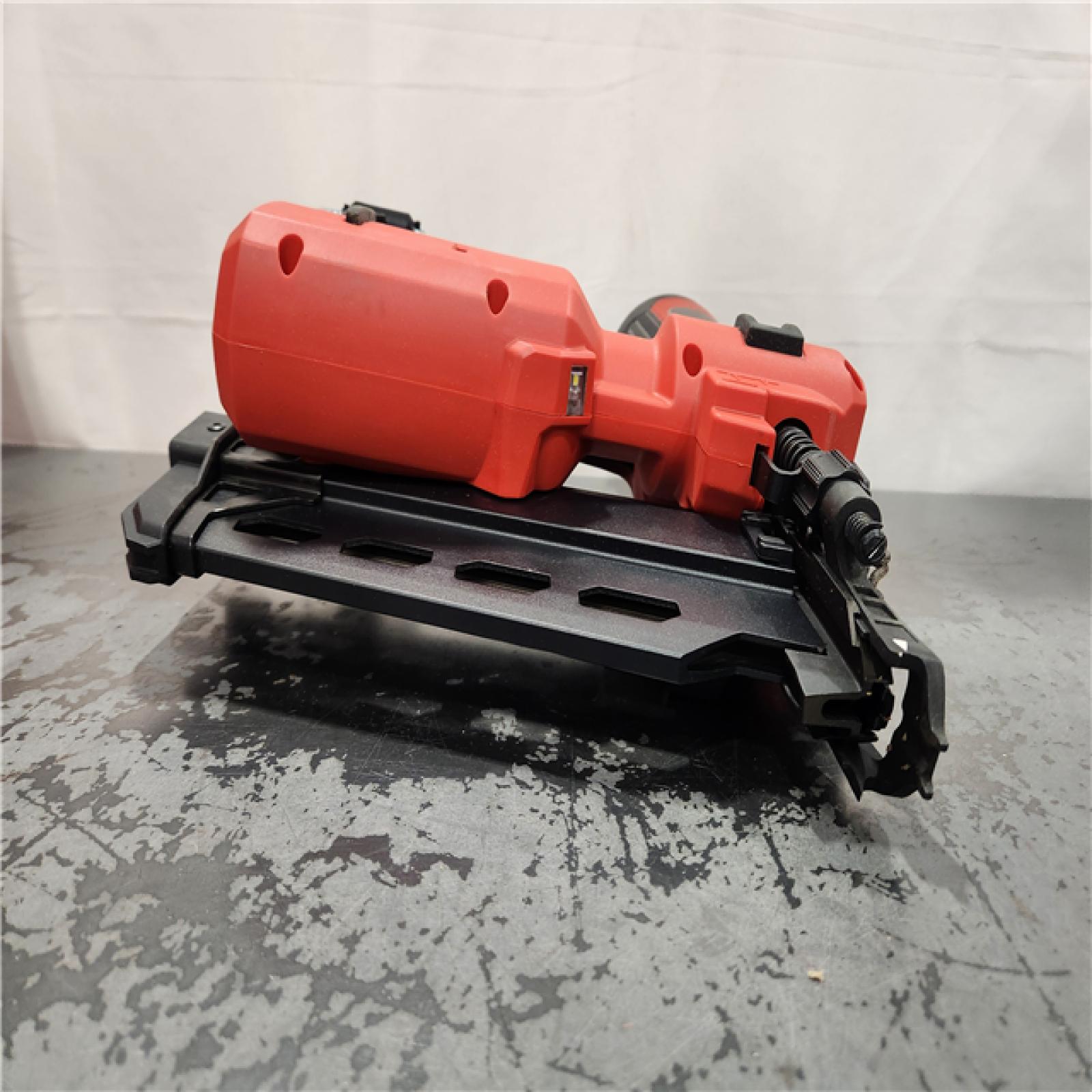 AS-IS- Nail Gun Cordless Strip Plastic 18 V