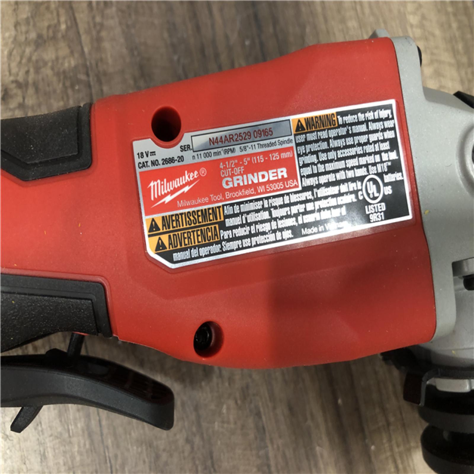 AS-IS Milwaukee 18V Lithium-Ion Brushless Cordless 4-1/2 in./5 in. Grinder w/Paddle Switch (Tool-Only)