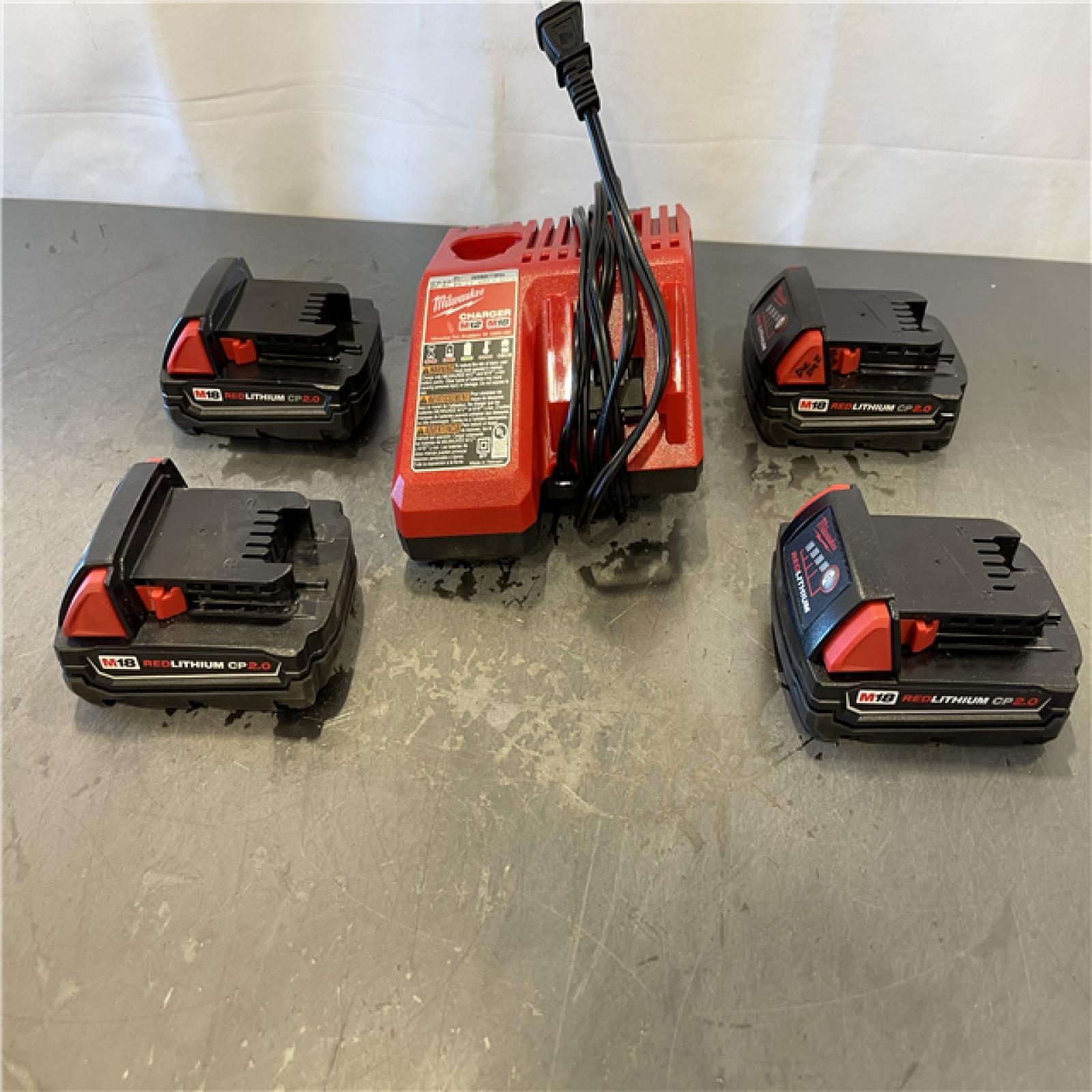 AS-IS  - Milwaukee M18 18-Volt Lithium-Ion Compact Battery Pack Kit (4 Pack)