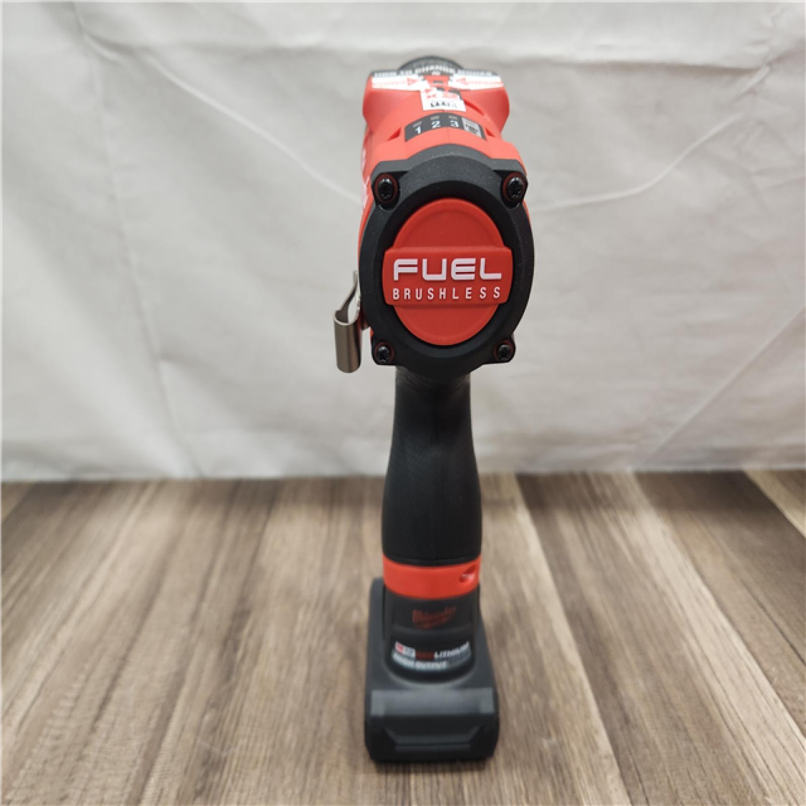 AS-IS- Milwaukee M12 FUEL 12V Li-Ion Brushless Cordless Stubby 3/8 in. Impact Wrench Kit W/(1) 5.0 Ah High Output Battery