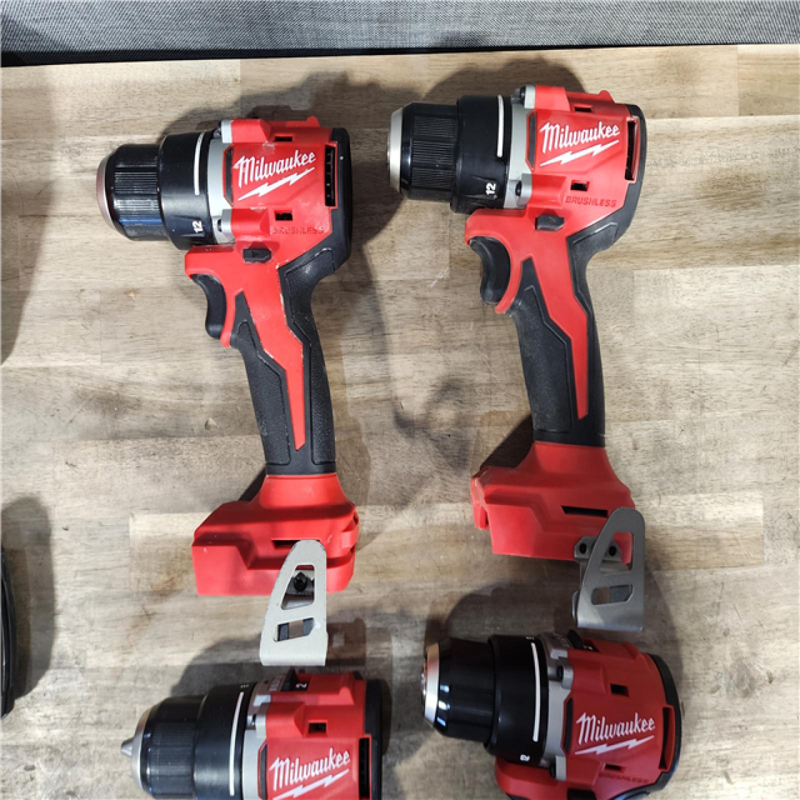 HOUSTON LOCATION - AS-IS MILWAUKEE 4 TOOL COMBO KIT W/ (2) BATTERY & CHARGER