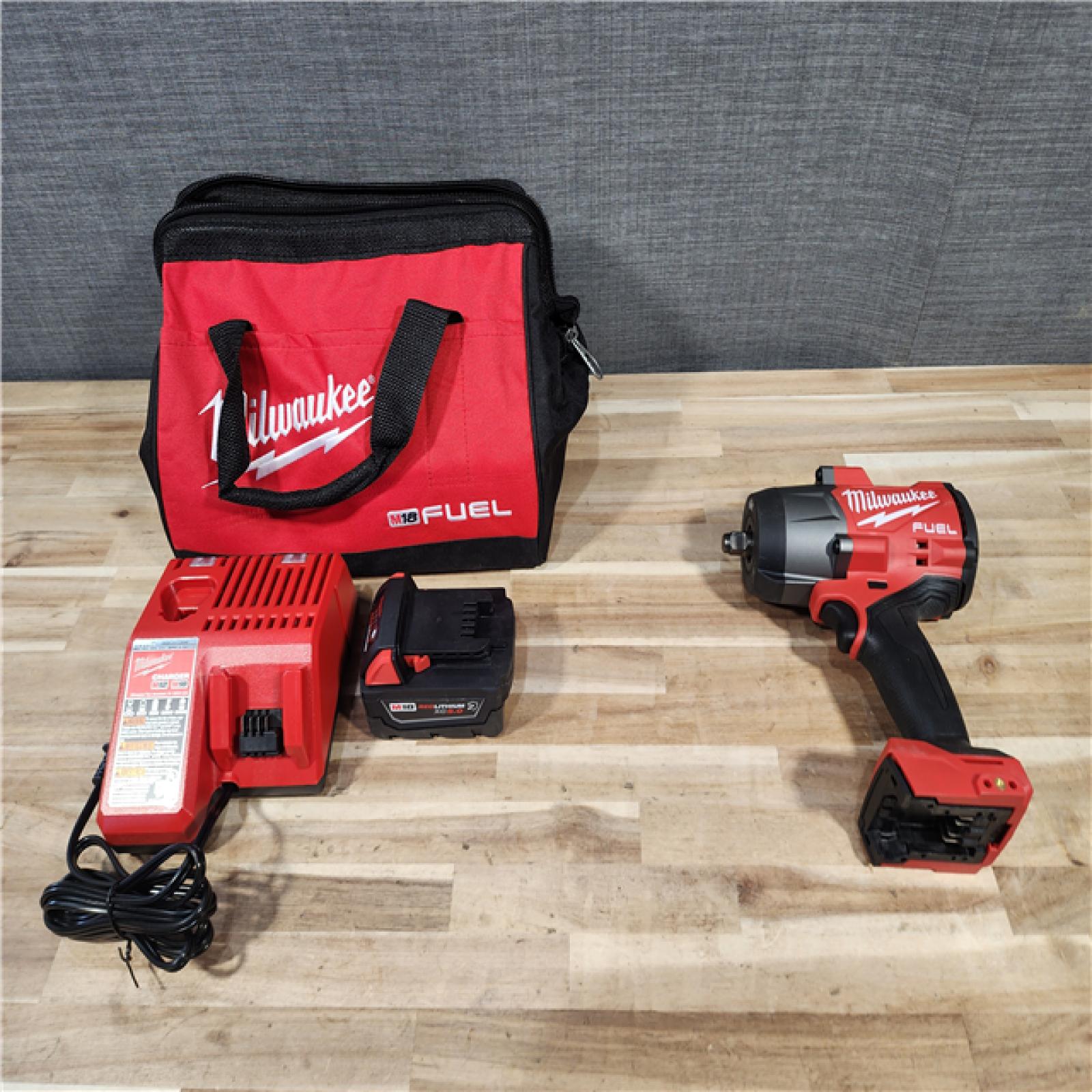 HOUSTON LOCATION - AS-IS (APPEARS LIKE NEW) Milwaukee FUEL 18V Lithium-Ion Brushless Cordless 1/2 in. Impact Wrench w/Friction Ring Kit