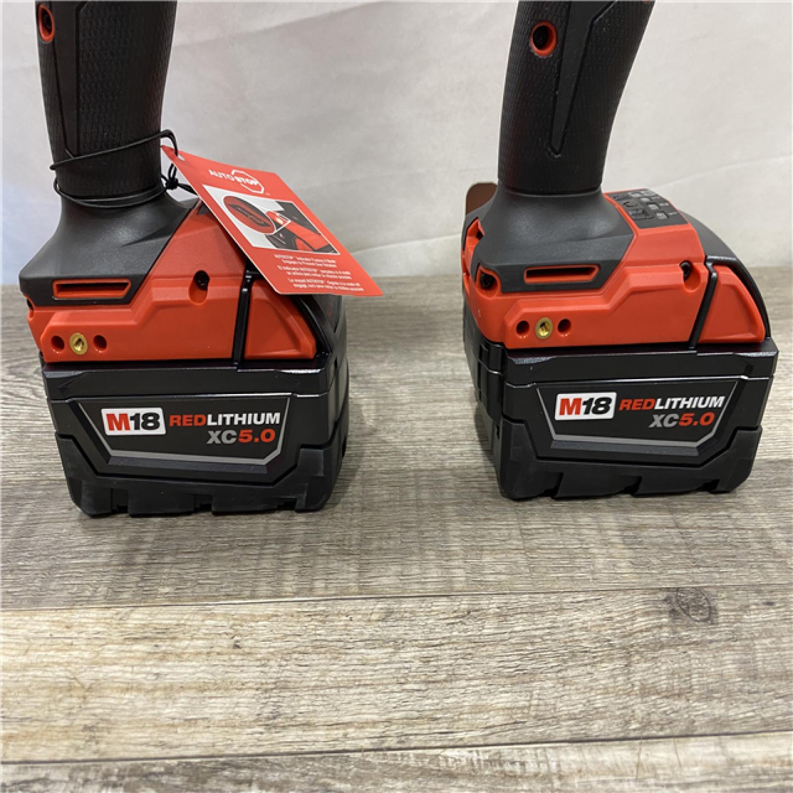 AS-IS Milwaukee FUEL 18V Lithium-Ion Brushless Cordless Hammer Drill and Impact Driver Combo Kit