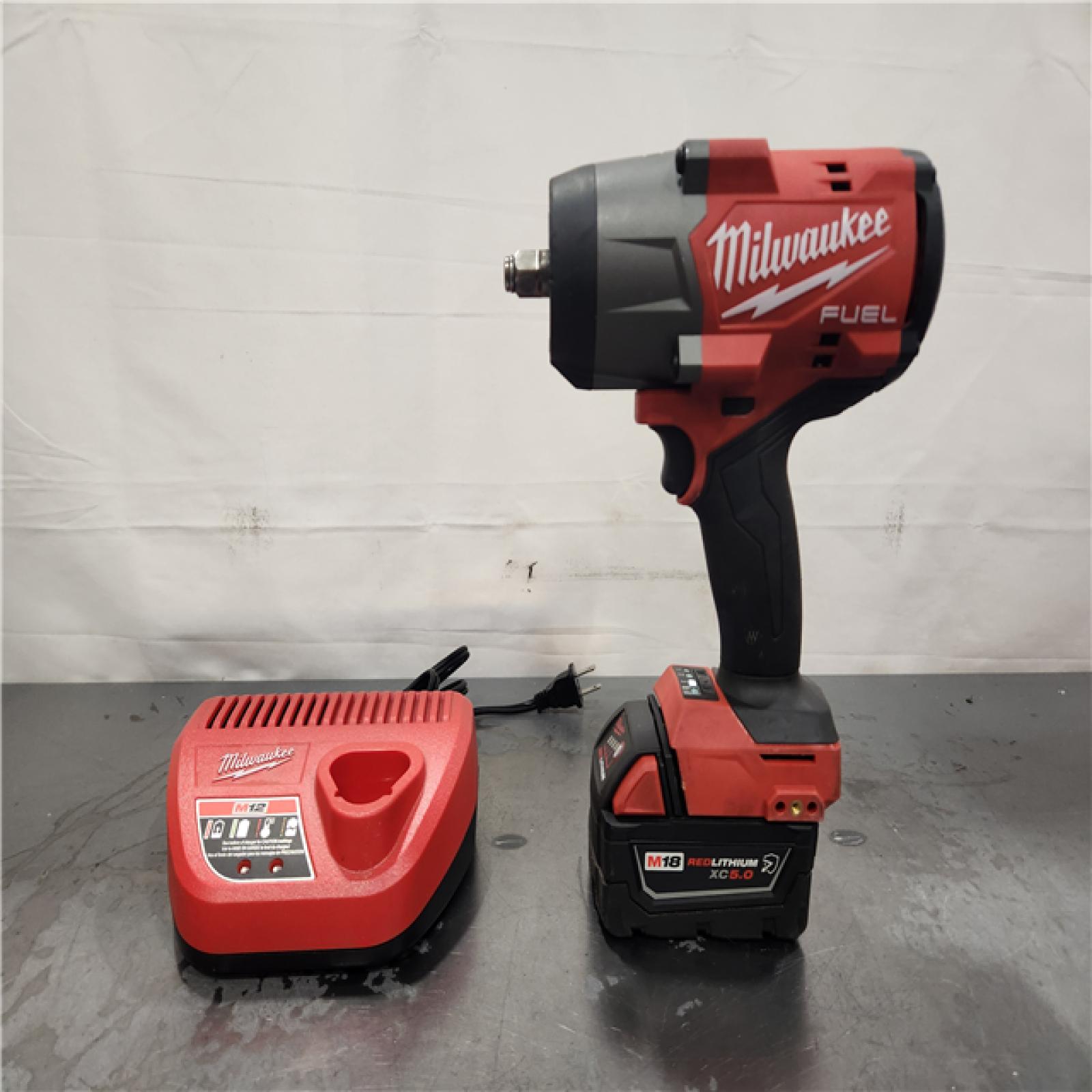 AS-IS- Milwaukee FUEL 18V Lithium-Ion Brushless Cordless 1/2 in. Impact Wrench w/Friction Ring Kit