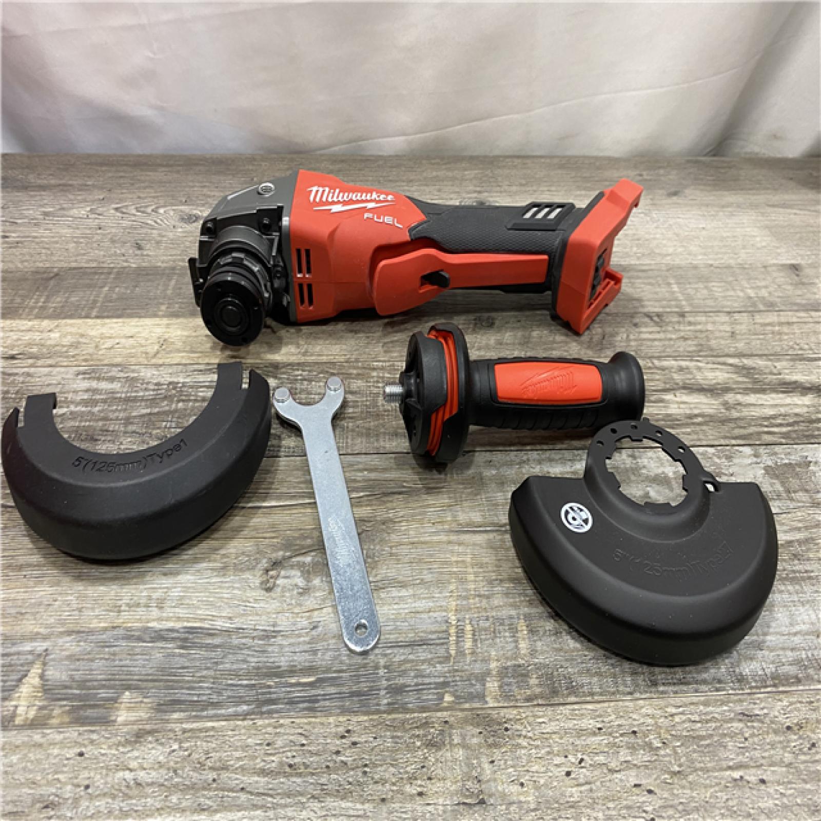 AS-IS Milwaukee FUEL 18V Lithium-Ion Brushless Cordless 4-1/2 in./5 in. Grinder with Variable Speed & Paddle Switch (Tool-Only)