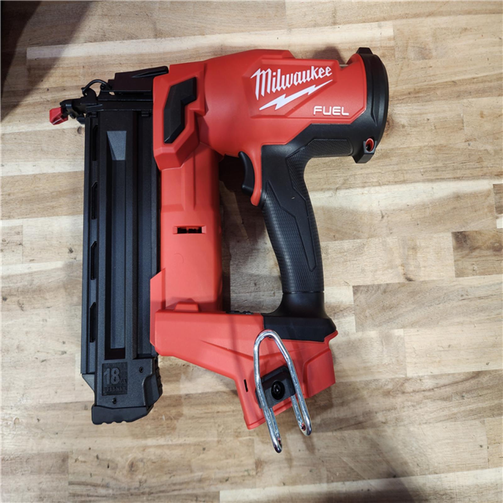 HOUSTON LOCATION - AS-IS (APPEARS LIKE NEW) Milwaukee M18 FUEL GEN II 18V 18-Gauge Lithium-Ion Brushless Cordless Brad Nailer Kit with One 2.0 Ah Battery  Charger and Bag