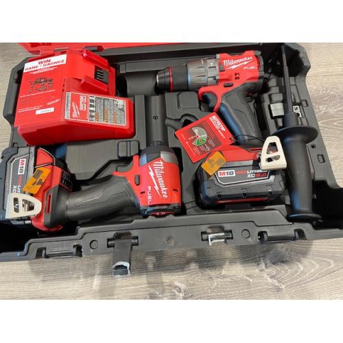 AS-IS Milwaukee FUEL 18V Lithium-Ion Brushless Cordless Hammer Drill and Impact Driver Combo Kit
