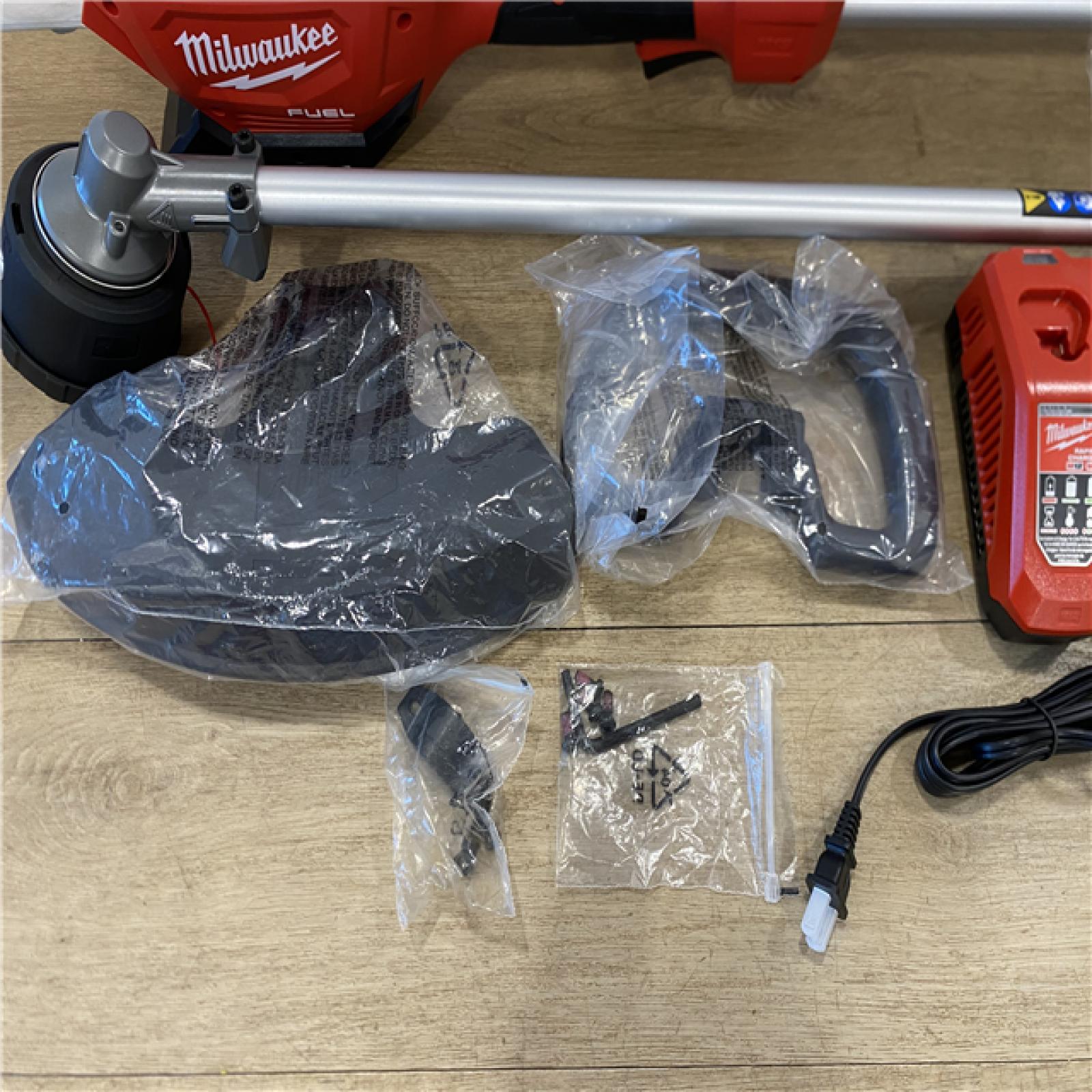 AS-IS Milwaukee FUEL 18V 16 in. Brushless Cordless Battery Powered String Trimmer Kit