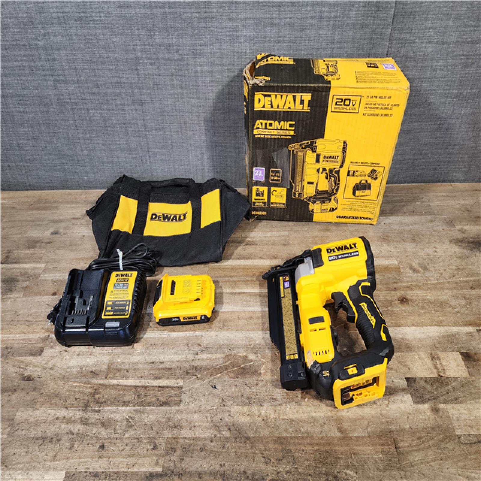HOUSTON LOCATION - AS-IS DEWALT ATOMIC 20V MAX Lithium Ion Cordless 23 Gauge Pin Nailer Kit