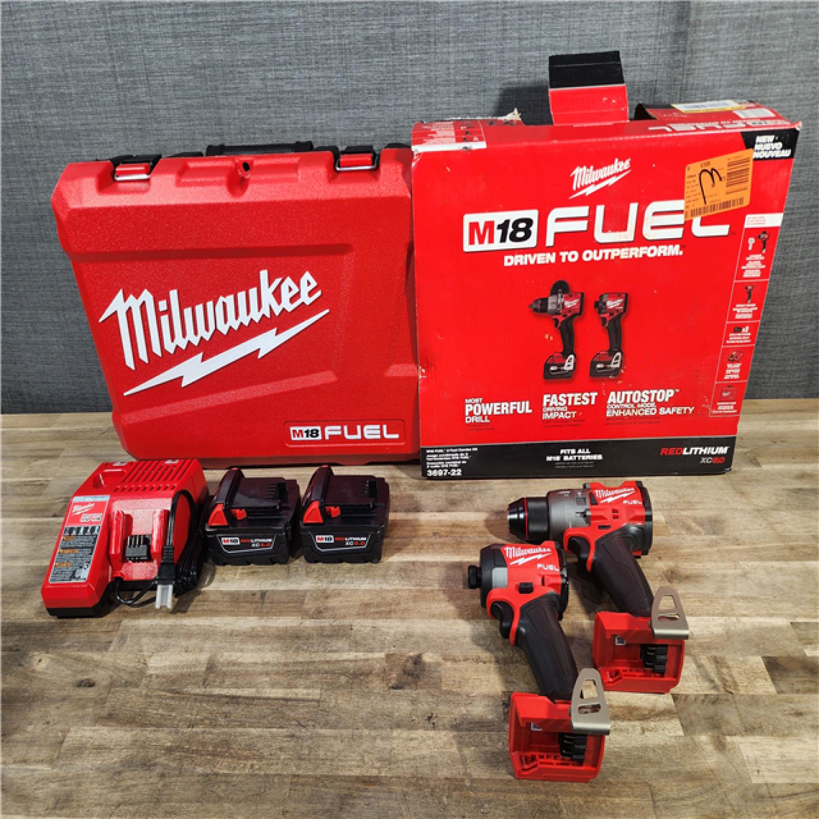 HOUSTON LOCATION - AS-IS (APPEARS LIKE NEW) MILWAUKEE M18 FUEL 18V Lithium-Ion Brushless Cordless Hammer Drill and Impact Driver Combo Kit (2-Tool) with 2 Batteries