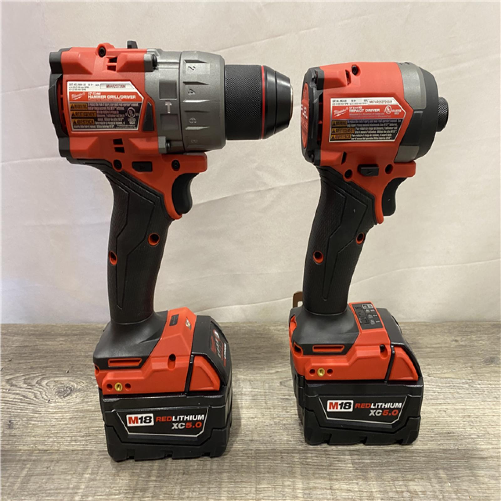 AS-IS Milwaukee FUEL 18V Lithium-Ion Brushless Cordless Hammer Drill and Impact Driver Combo Kit