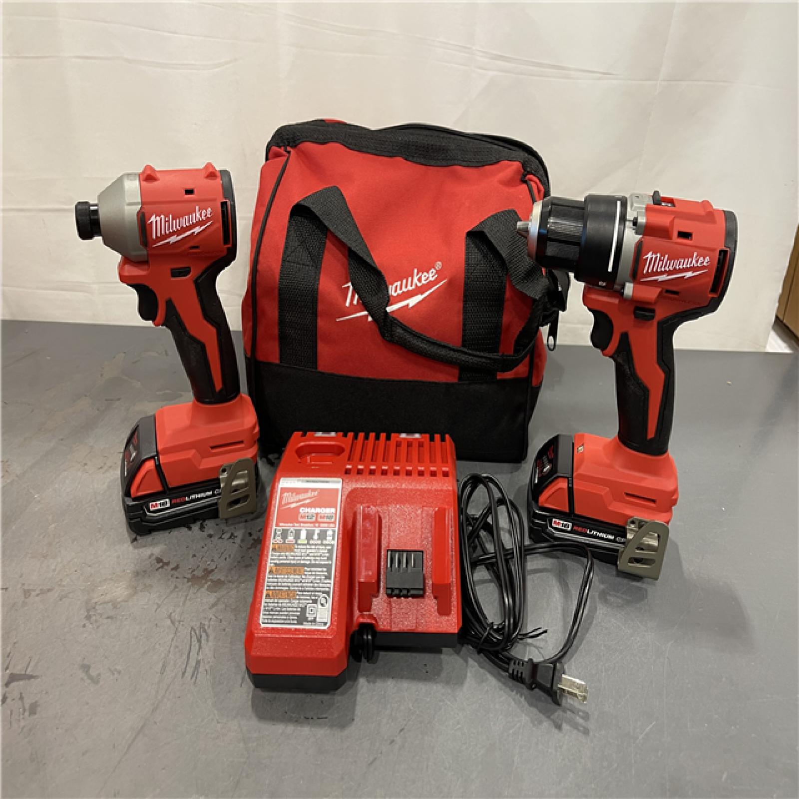 AS-IS - Milwaukee M18 18V Lithium-Ion Brushless Cordless Compact Drill/Impact Combo Kit
