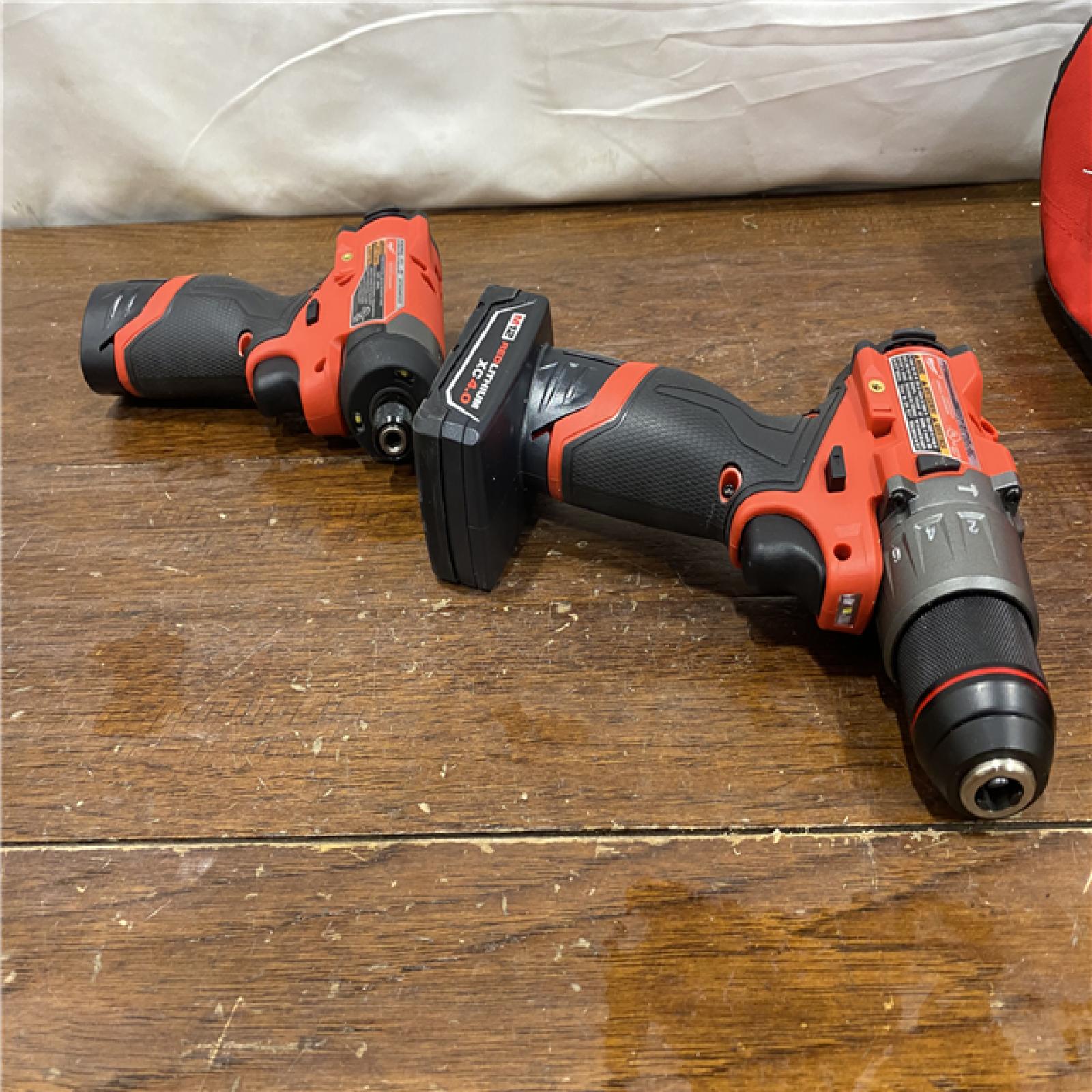 AS-IS Milwaukee 3497-22 12V Brushless Hammer Drill and Impact Driver Combo Kit