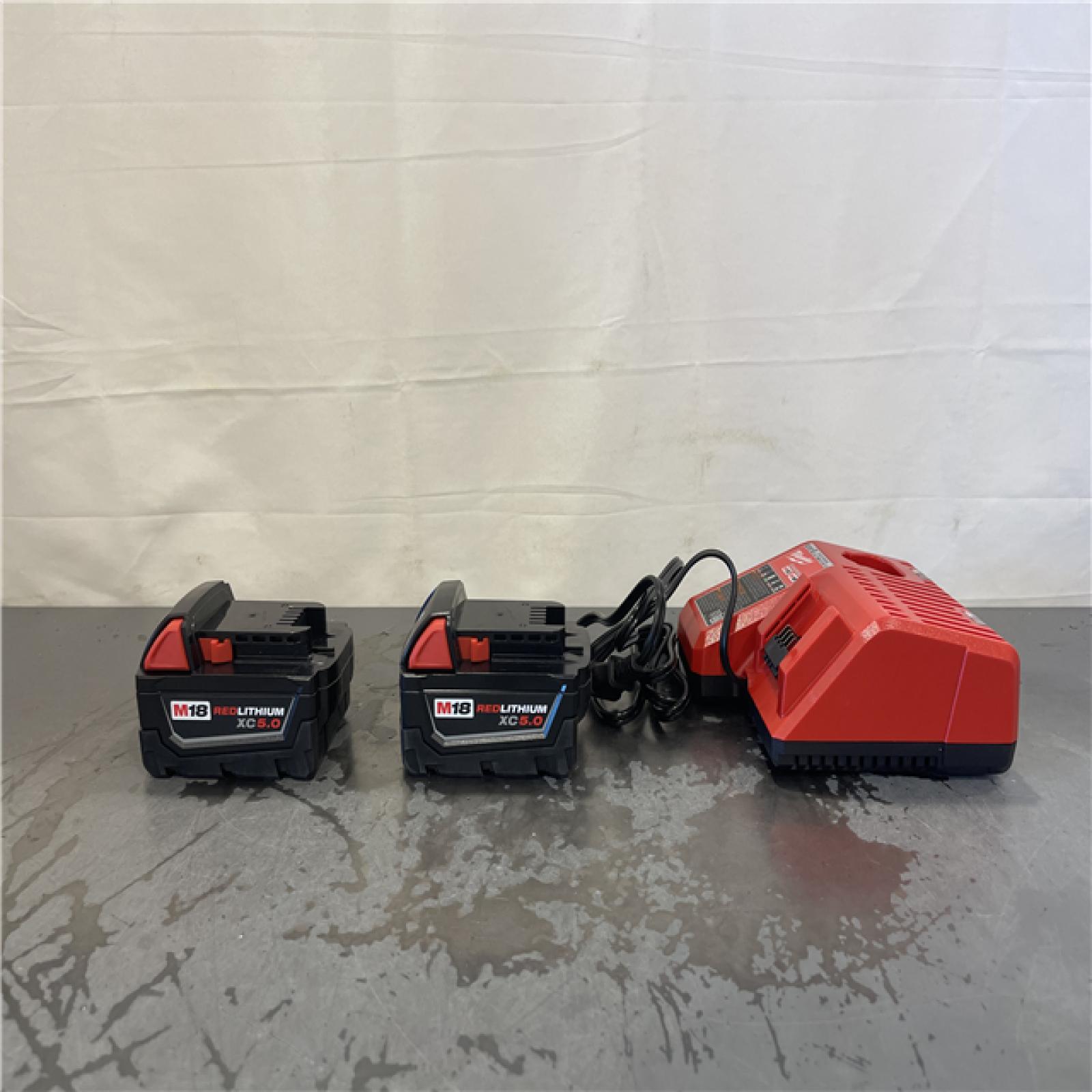 AS-IS- M18 18-Volt Lithium-Ion XC Starter Kit with Two 5.0Ah Batteries and Charger
