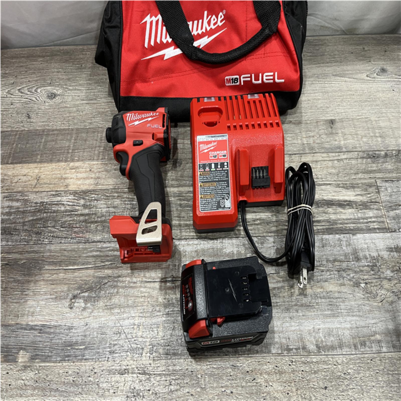 AS-IS Milwaukee FUEL SURGE 18V Lithium-Ion Brushless Cordless 1/4 in. Hex Impact Driver Kit