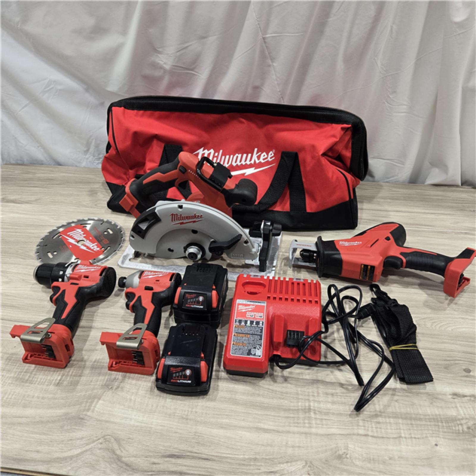 AS-IS Milwaukee M18 4-Tool Combo Kit