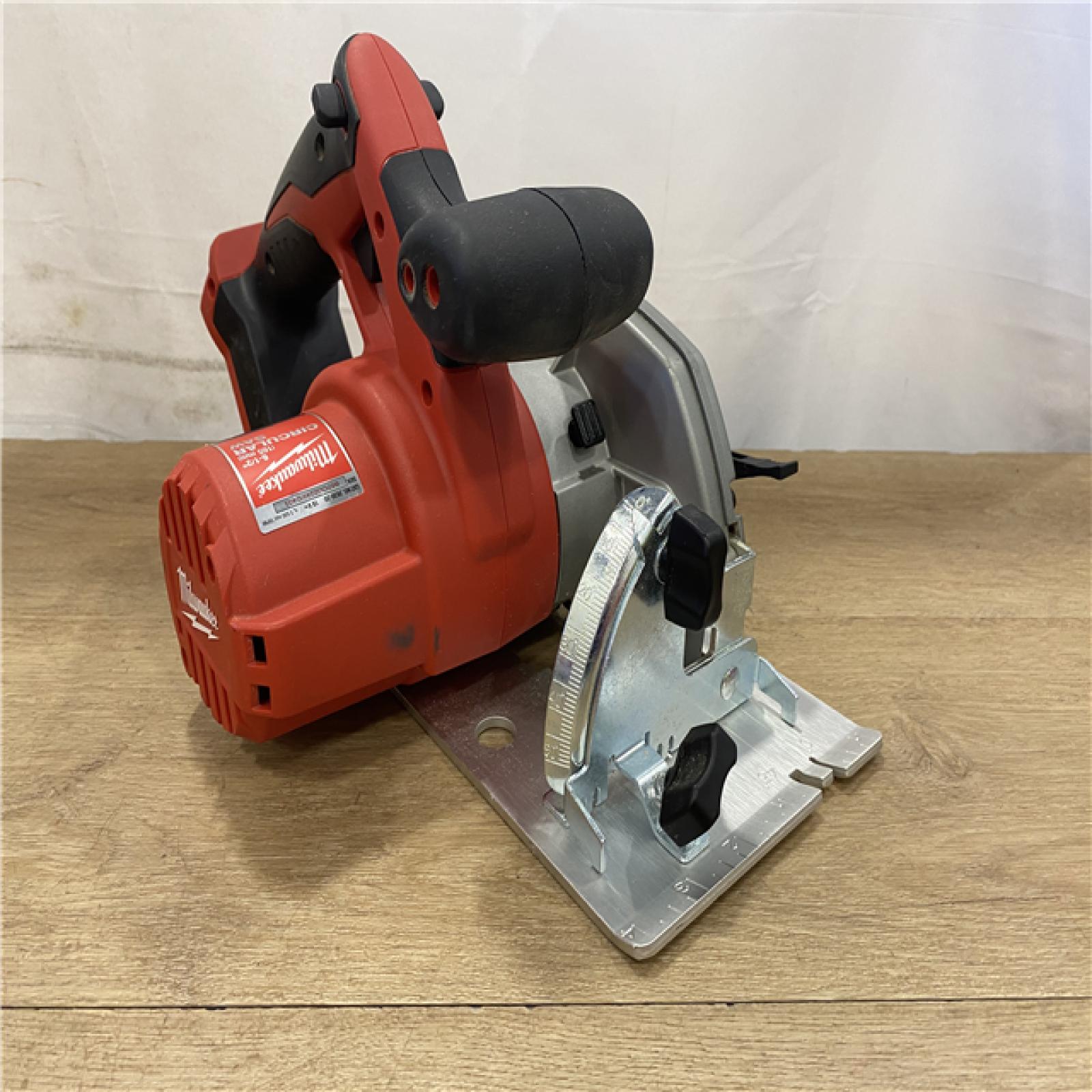AS-IS Milwaukee 18V Lithium-Ion Cordless 6-1/2 in. Circular Saw (Tool-Only)