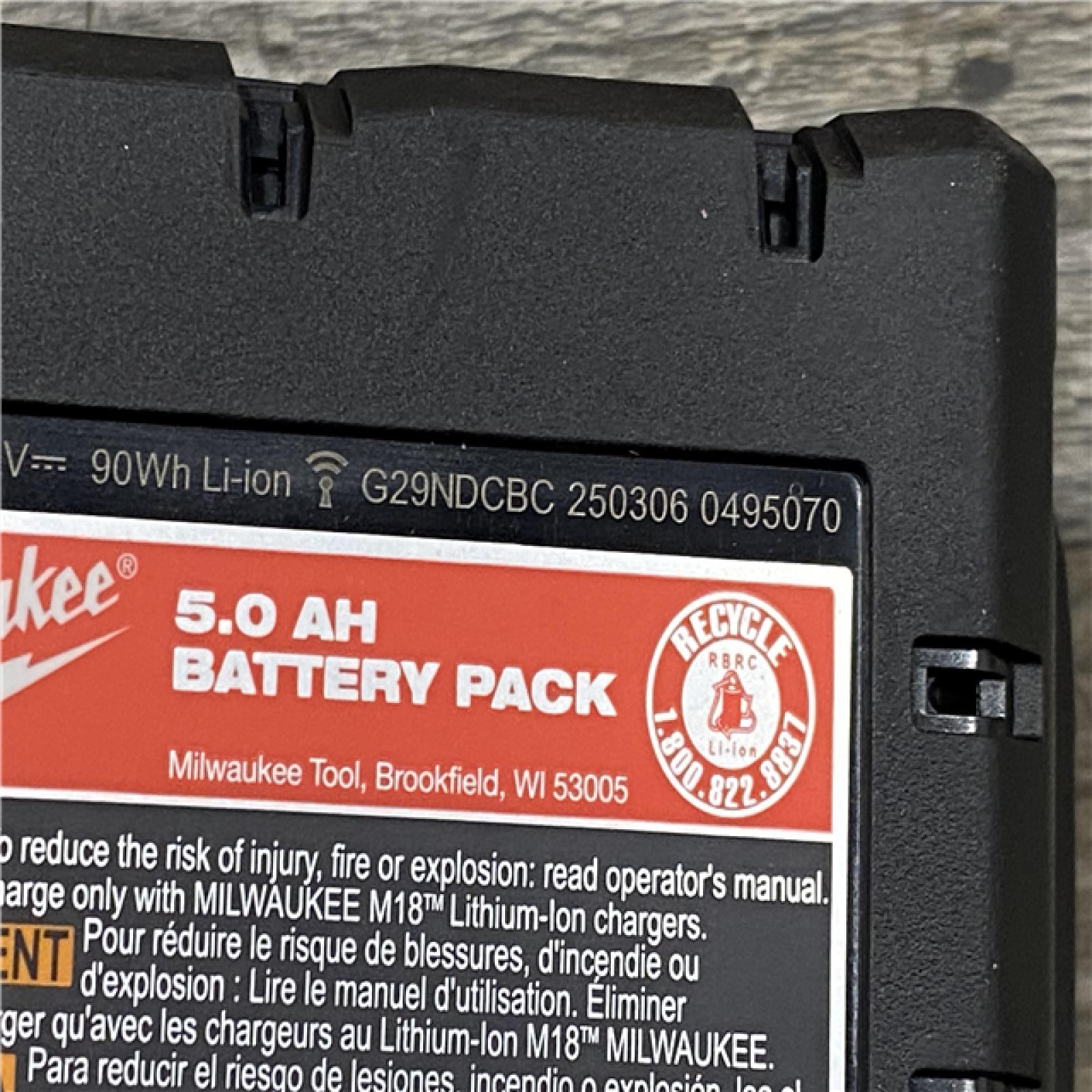 AS-IS Milwaukee FUEL SURGE 18V Lithium-Ion Brushless Cordless 1/4 in. Hex Impact Driver with (2) 5.0 Ah Battery and Charger
