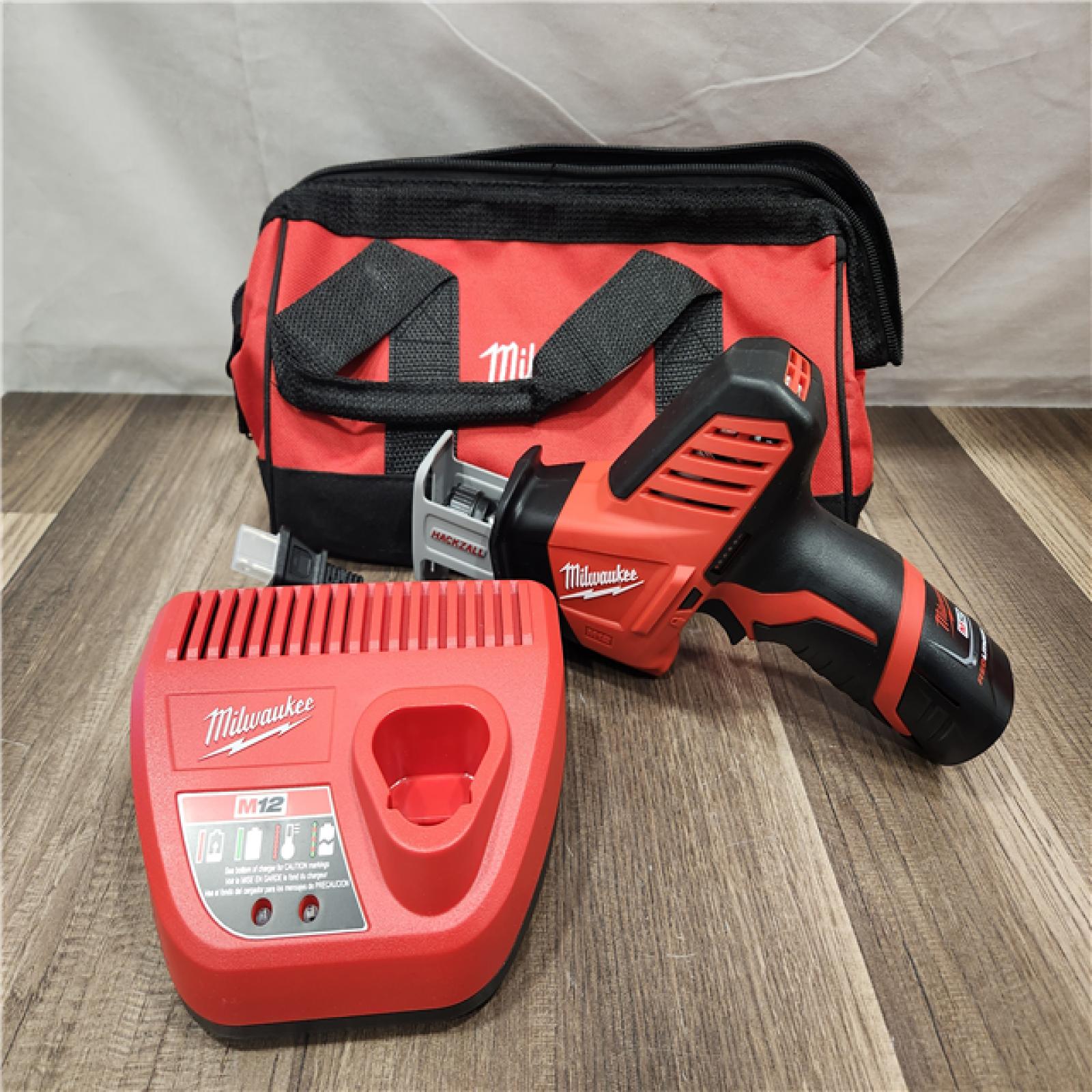 AS-IS- Milwaukee 12V 1.5Ah Cordless Straight Handle Reciprocating Saw Kit