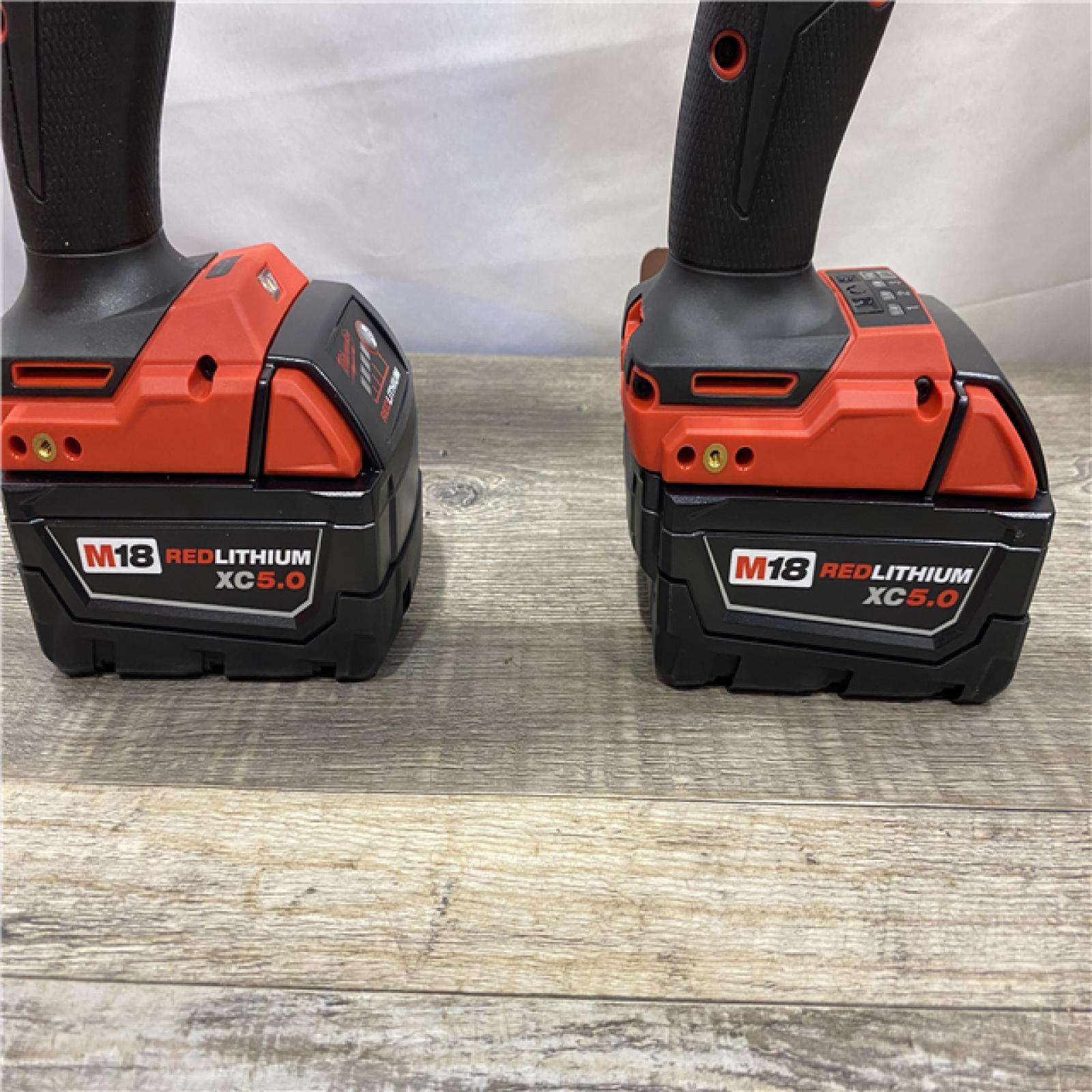 AS-IS Milwaukee FUEL 18V Lithium-Ion Brushless Cordless Hammer Drill and Impact Driver Combo Kit