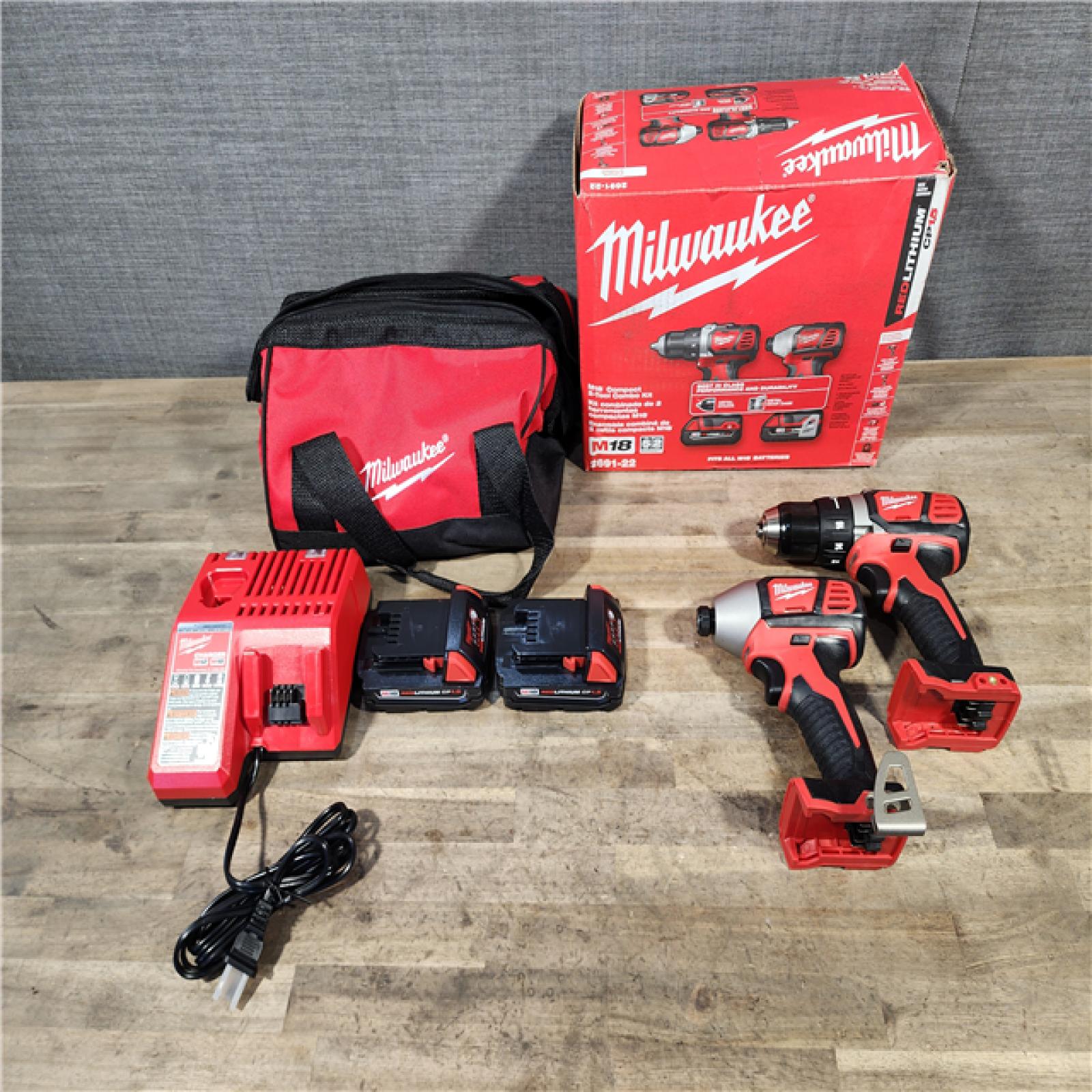 HOUSTON LOCATION - AS-IS Milwaukee 18V Cordless Brushed 2-Tool Drill/Driver and Impact Driver Kit
