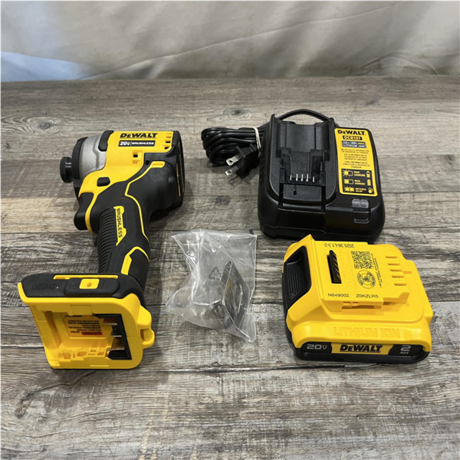 AS-IS DEWALT Atomic 20V Max Lithium-Ion Brushless Cordless Compact 1/4 in. Impact Driver Kit