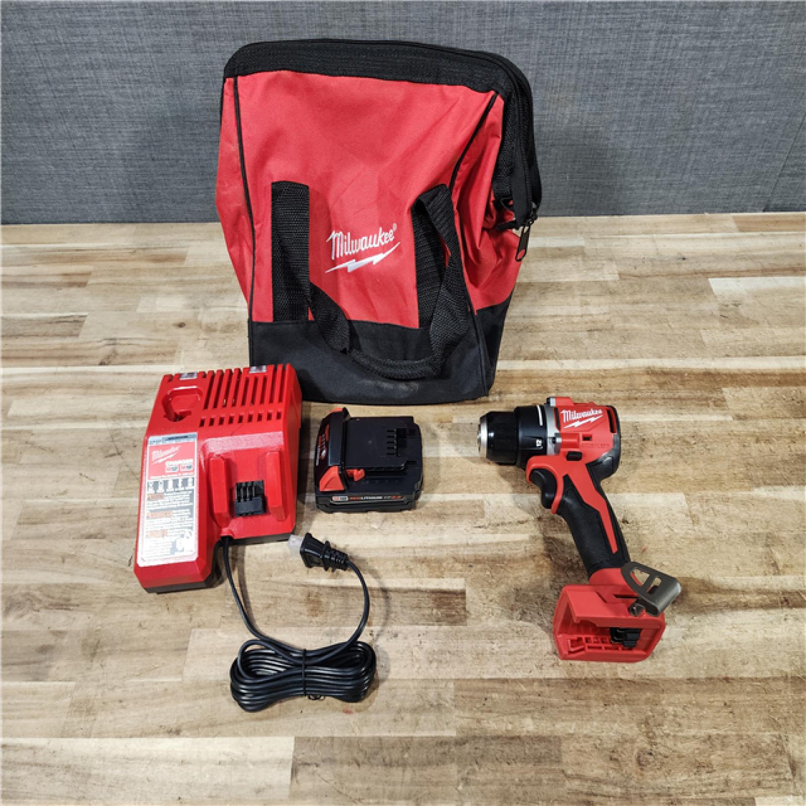 HOUSTON LOCATION - AS - IS Milwaukee 18V Lithium-Ion Brushless Cordless 1/2 in. Compact Drill/Driver with kit