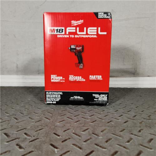 Houston location- AS-IS Milwaukee M18 FUEL 1/2 Mid-Torque Impact Wrench  Appears in new condition (TOOL-ONLY)