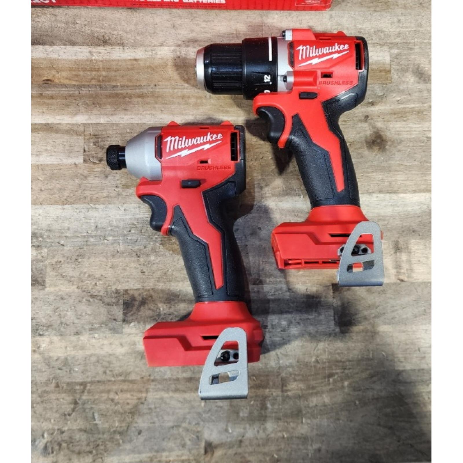 HOUSTON LOCATION - AS-IS Milwaukee M18 18V Lithium-Ion Brushless Cordless Compact Drill/Impact Combo Kit (2-Tool) W/(2) 2.0 Ah Batteries  Charger & Bag