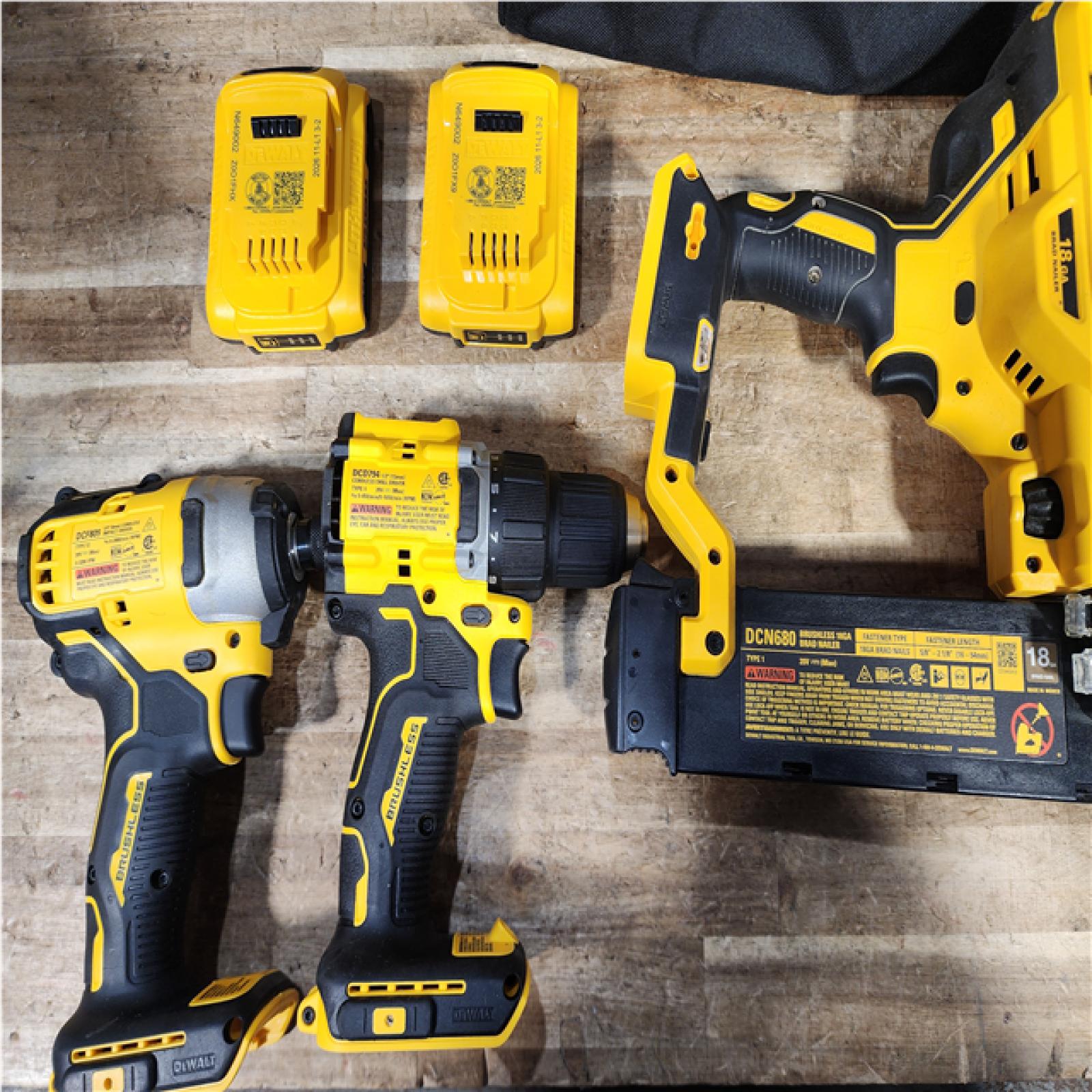 Houston Location AS-IS DEWALT Drill and Impact Nail Gun and Batteries QTY/ 2 with Charger