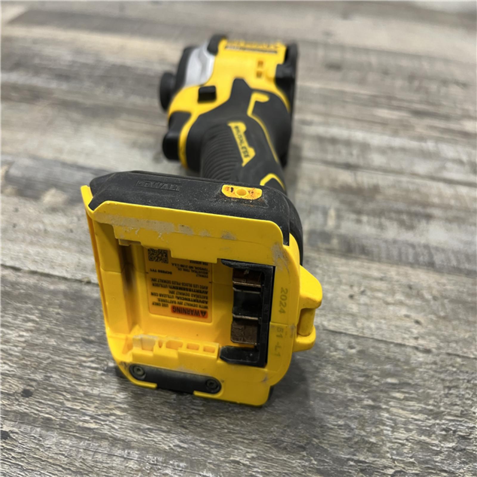 AS-IS DEWALT ATOMIC 20V MAX Cordless Brushless Compact 1/4 in. Impact Driver (Tool Only)