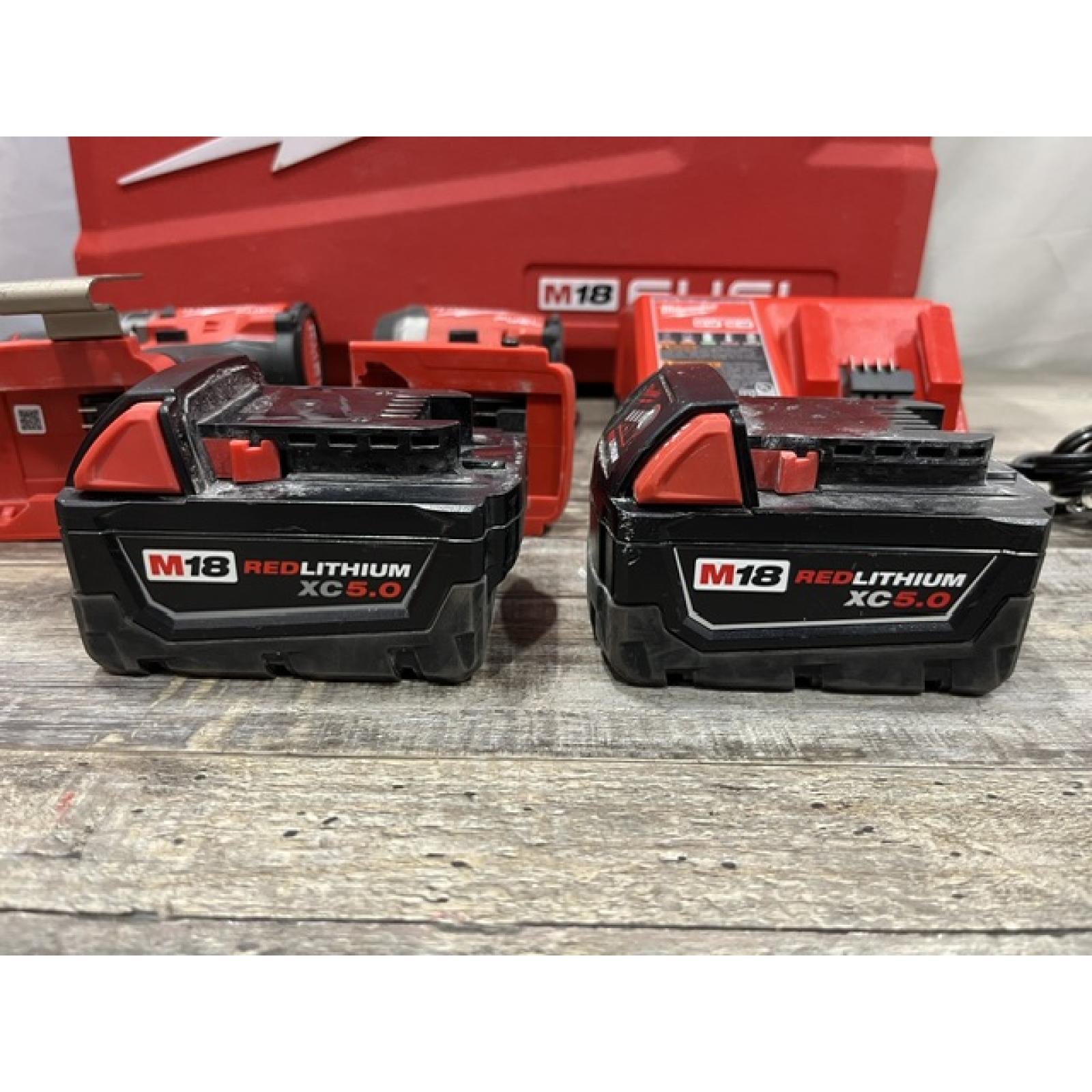 AS-IS Milwaukee FUEL 18V Lithium-Ion Brushless Cordless Hammer Drill and Impact Driver Combo Kit