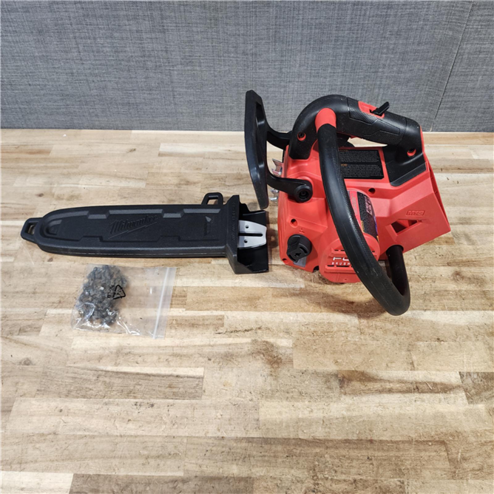 HOUSTON LOCATION - AS - IS Milwaukee FUEL 14 in. 18V Lithium-Ion Brushless Cordless Battery Top Handle Chainsaw (Tool Only)