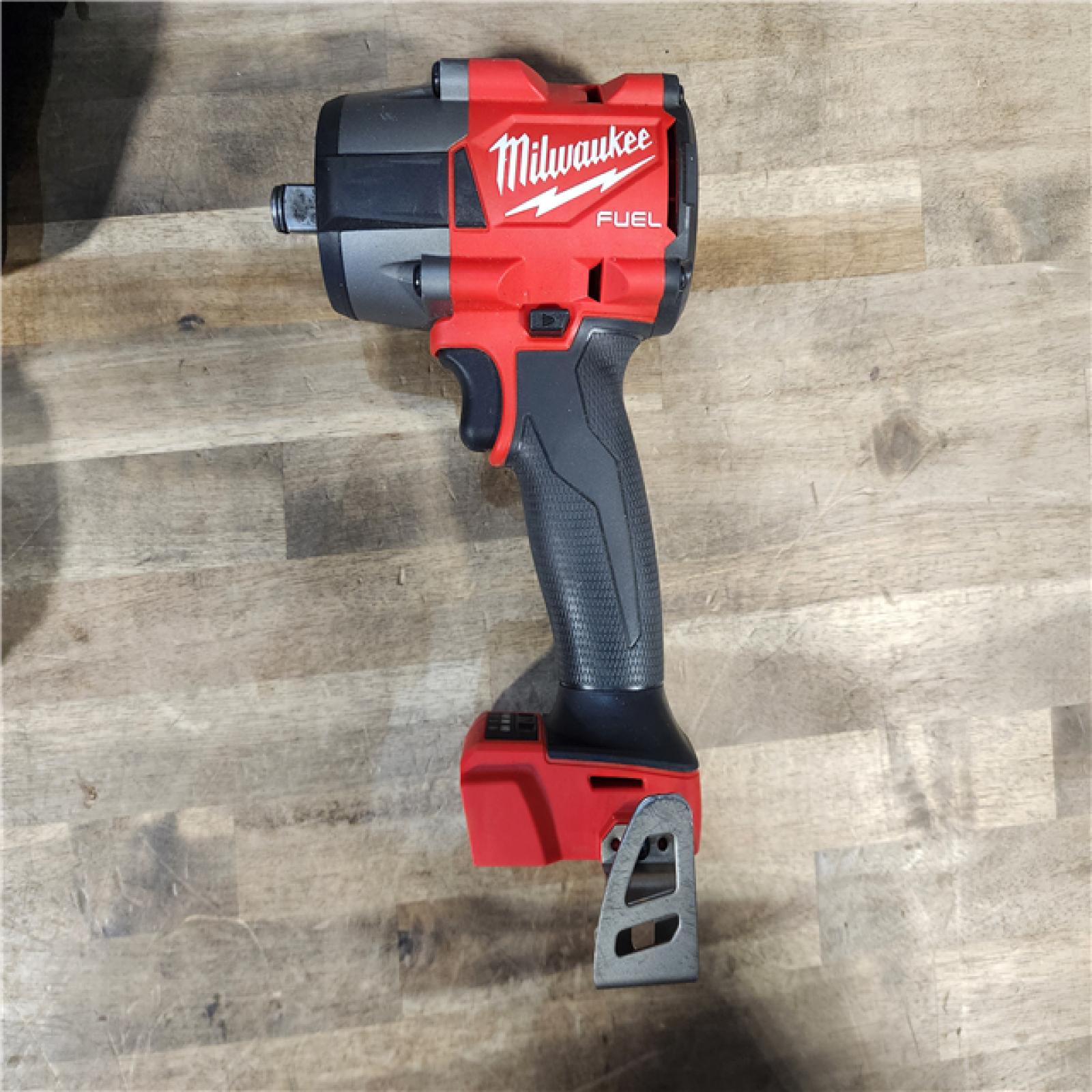 HOUSTON - LOCATION - AS-IS Milwaukee M18 18V Fuel 1/2  Mid-Torque Impact Wrench Cordless Lithium-Ion Brushless with BATTERY & CHARGER
