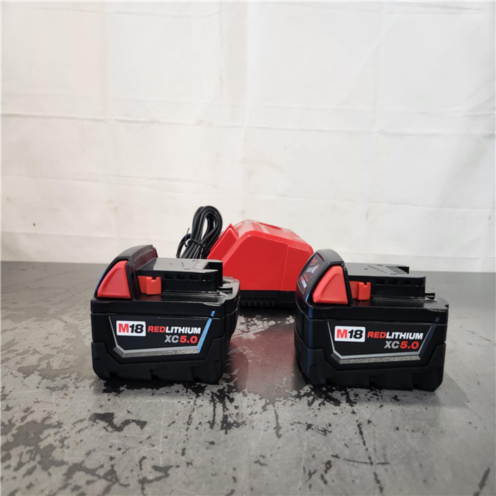 AS-IS- Milwaukee 18-Volt Lithium-Ion XC Starter Kit with Two 5.0Ah Batteries and Charger
