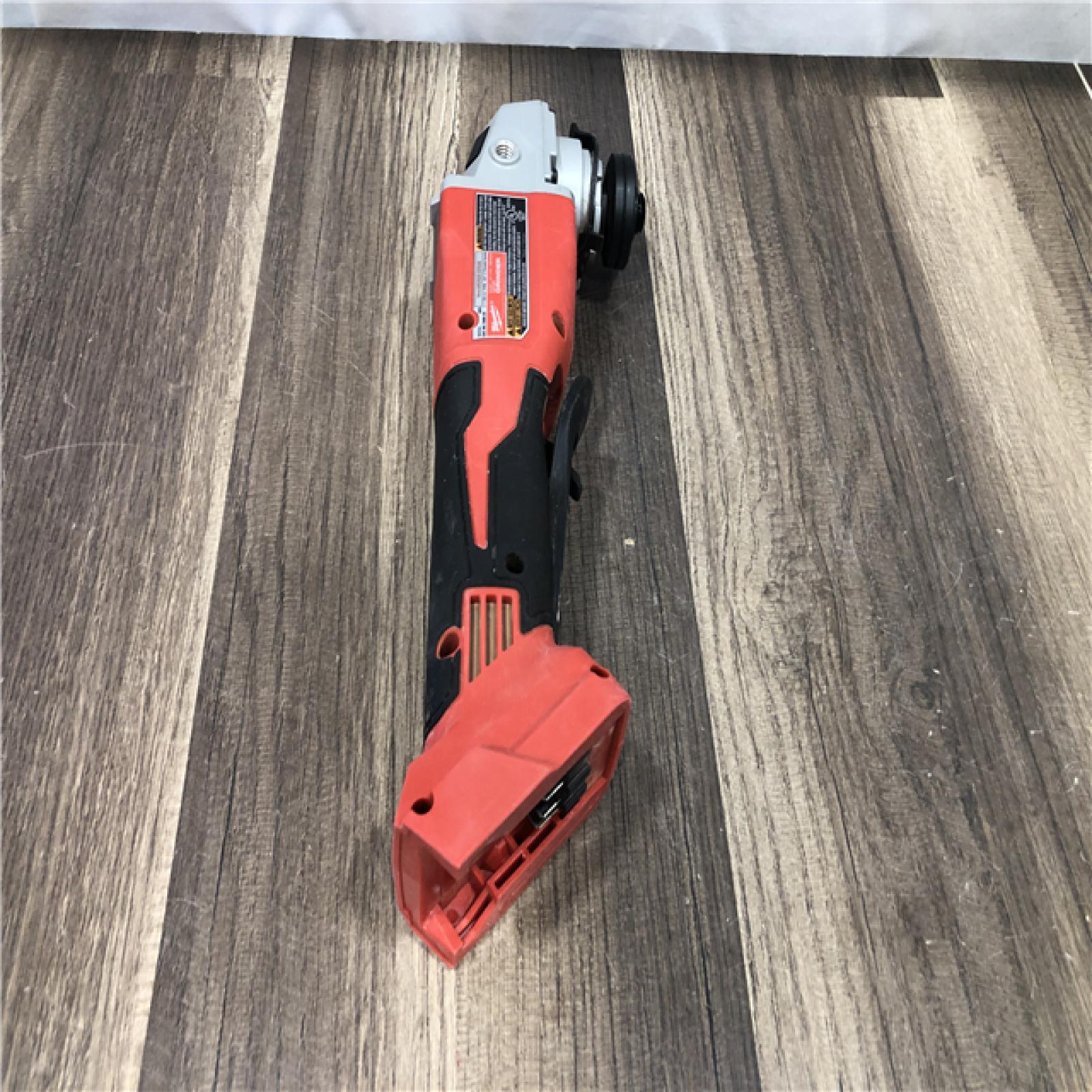 AS-IS Milwaukee 18V Lithium-Ion Brushless Cordless 4-1/2 in./5 in. Grinder w/Paddle Switch (Tool-Only)