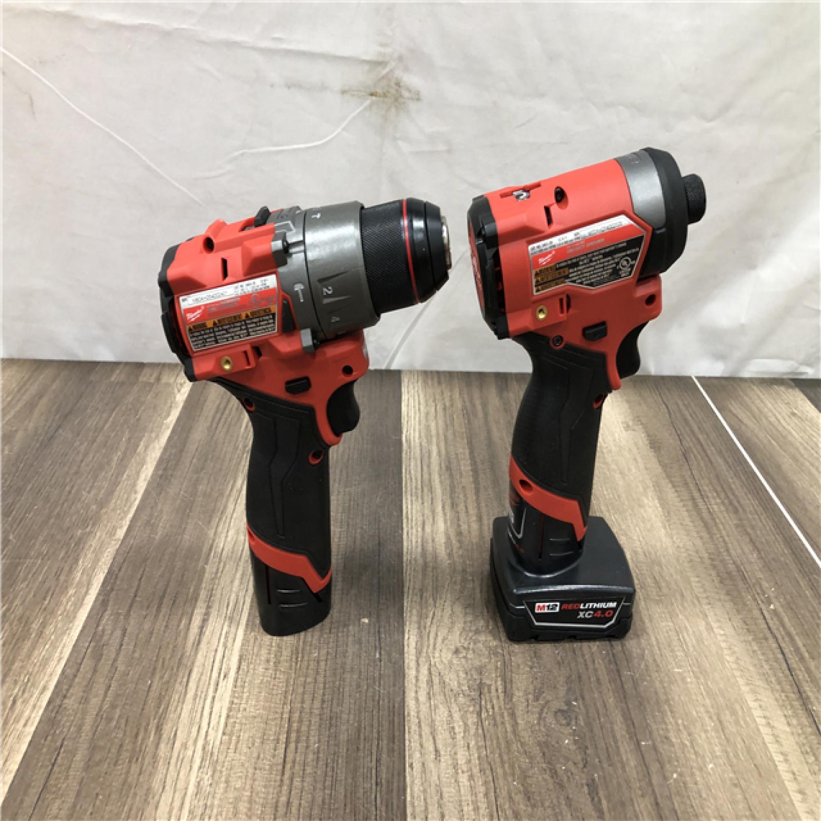 AS-IS Milwaukee FUEL 12-Volt Lithium-Ion Brushless Cordless Hammer Drill and Impact Driver Combo Kit
