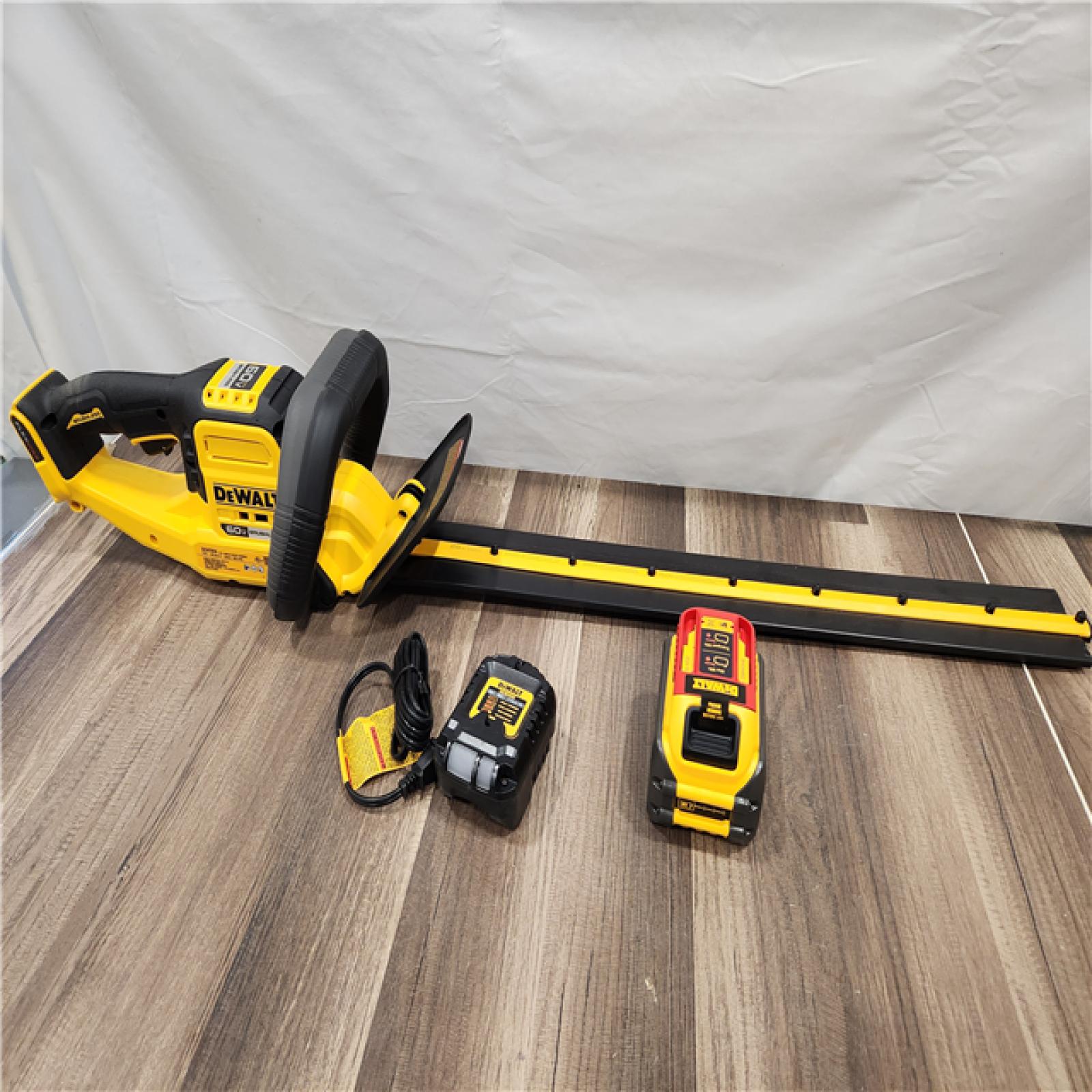 LIKE NEW! - FLEXVOLT 60V MAX 26 in. Brushless Cordless Battery Powered Hedge Trimmer Kit with (1) FLEXVOLT 2 Ah Battery Charger