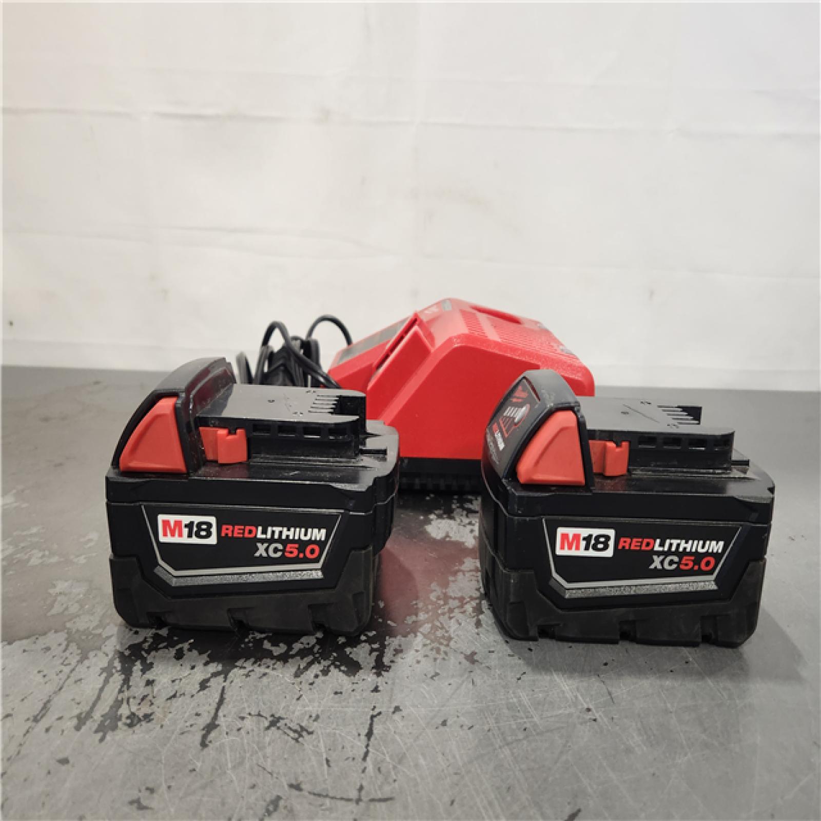 AS-IS- Milwaukee 18-Volt Lithium-Ion XC Starter Kit with Two 5.0Ah Batteries and Charger