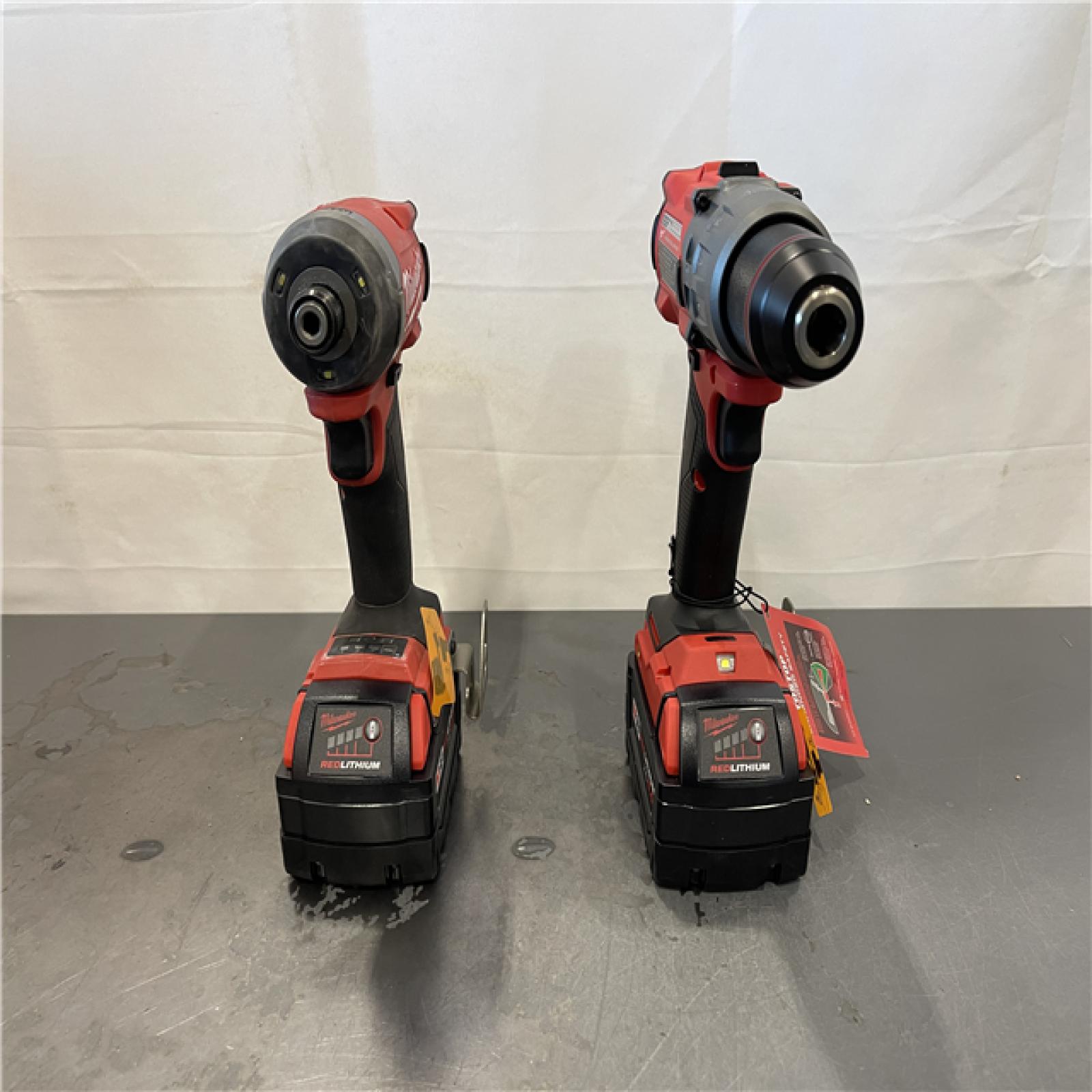 AS-IS- AS-IS - Milwaukee M18 FUEL 18V Lithium-Ion Brushless Cordless Hammer Drill and Impact Driver Combo Kit (2-Tool) with 2 Batteries